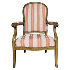 Fauteuil Voltaire en noyer