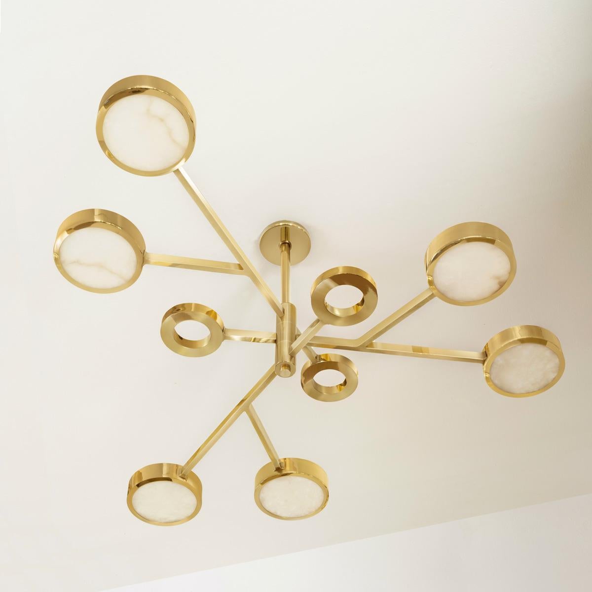The Volterra ceiling light is an ode to the historic Tuscan city by the same name known for its striking architecture and its precious stone quarries. The fixture exemplifies these qualities with its sculptural counter-balance design, cast brass