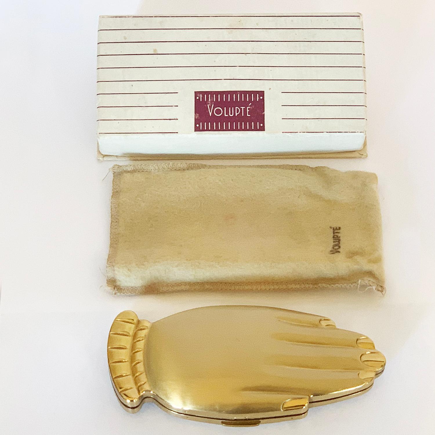 Art Deco Compact by Volupte, U.S.A., Ladies Gold Hand Double Lid Powder Compact Dated 1947, complete with Gilt named original Powder Puff, Felt named protection bag and Complete box with Serial Number stamped to rear “94 654”. The outer hinge and