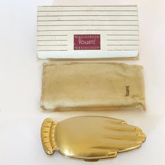 Volupte Home Coming Queen Golden Gesture hand figural compact in original box