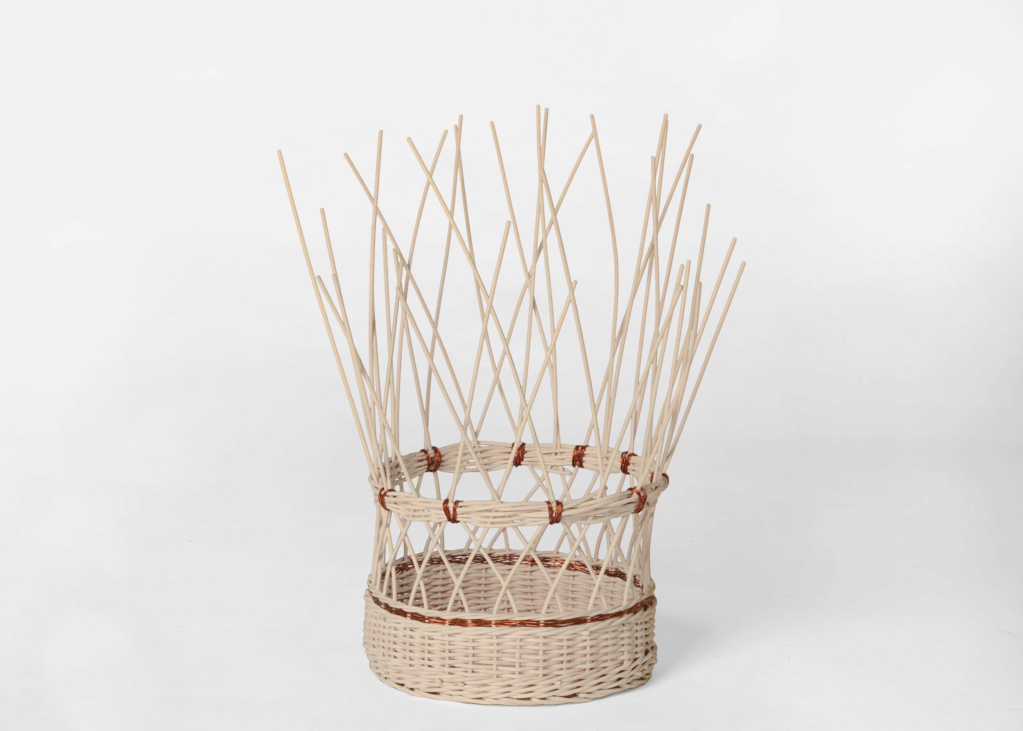 Small voodoo basket by Edizione Limitata
Limited Edition. Signed and numbered.
Designers: Simone Fanciullacci
Dimensions: H 40 × W 25 × L 25 cm
Materials: handwoven rattan, copper wire

Edizione Limitata, that is to say “Limited Edition”, is a brand