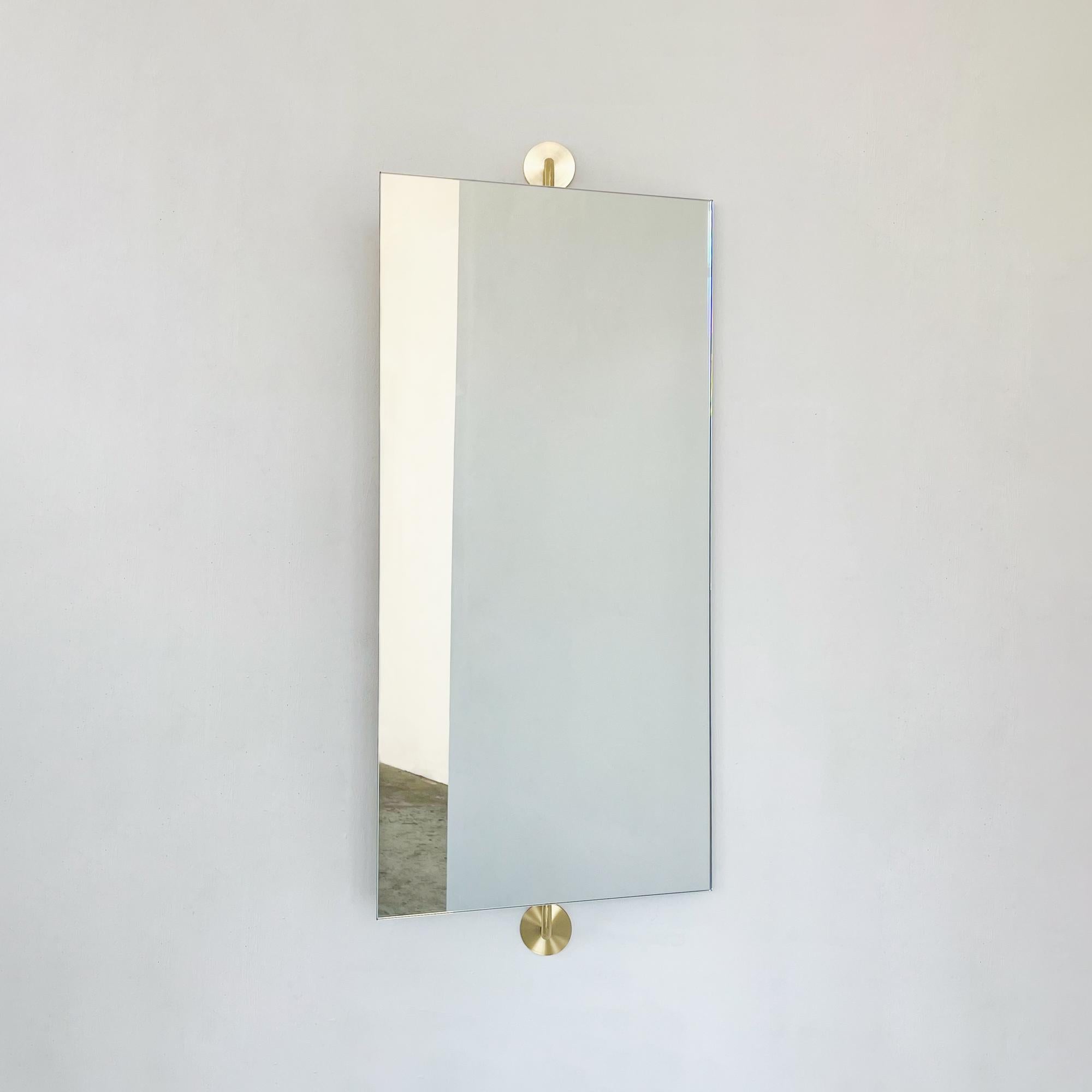 British Vorso Wall Attached Suspended Rotating Rectangular Mirror, Brushed Brass Backing For Sale