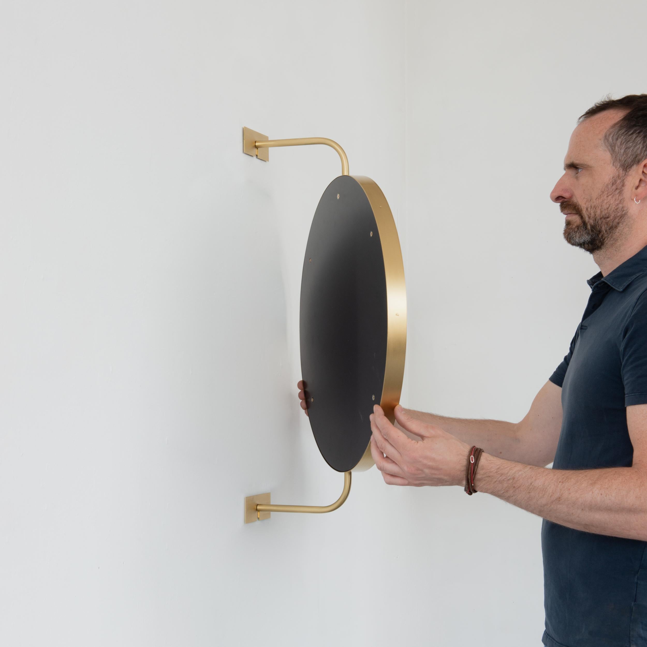 Vorso Wall Attached Suspended Rotating Round Mirror with Brushed Brass Frame For Sale 3