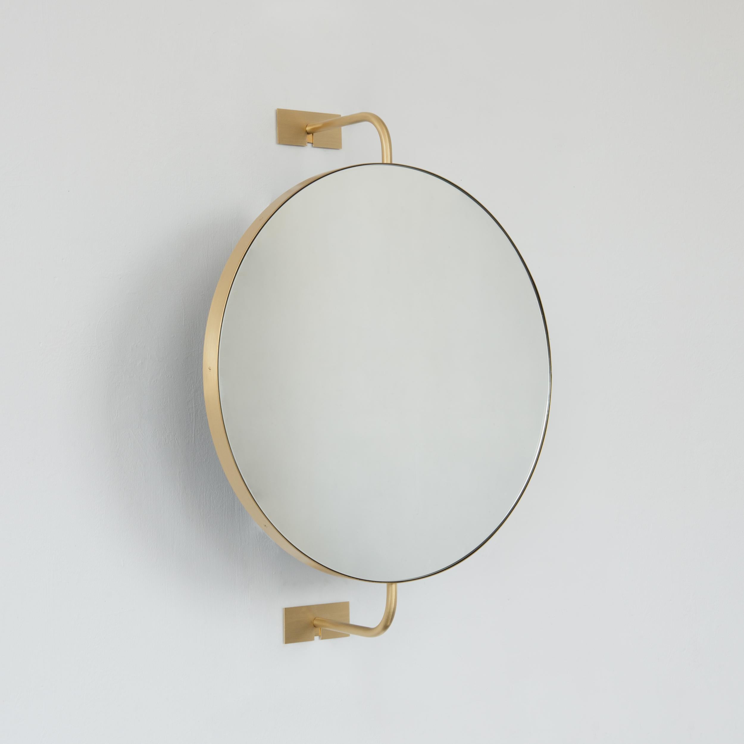 Art Deco Vorso Wall Attached Suspended Rotating Round Mirror with Brushed Brass Frame For Sale