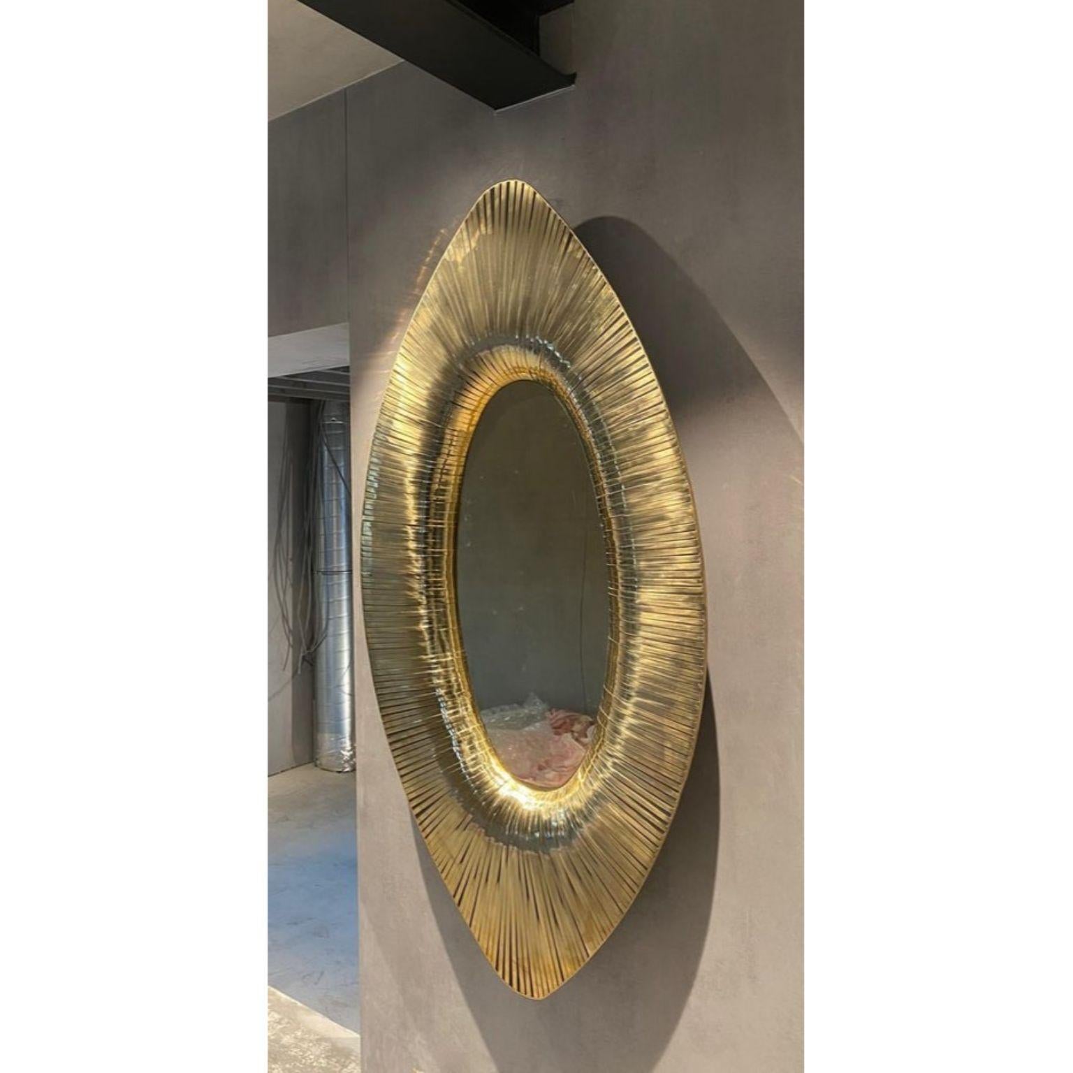 Vortex mirror sculpted by Yann Dessauvages
Signed
Dimensions: D 160 x H 80 cm
Materials: Brass and resin

Yann Dessauvages °June 1989 born in Brussels is a Belgian autodidact artist-designer. As the child of a teacher and a metalworker, he grew
