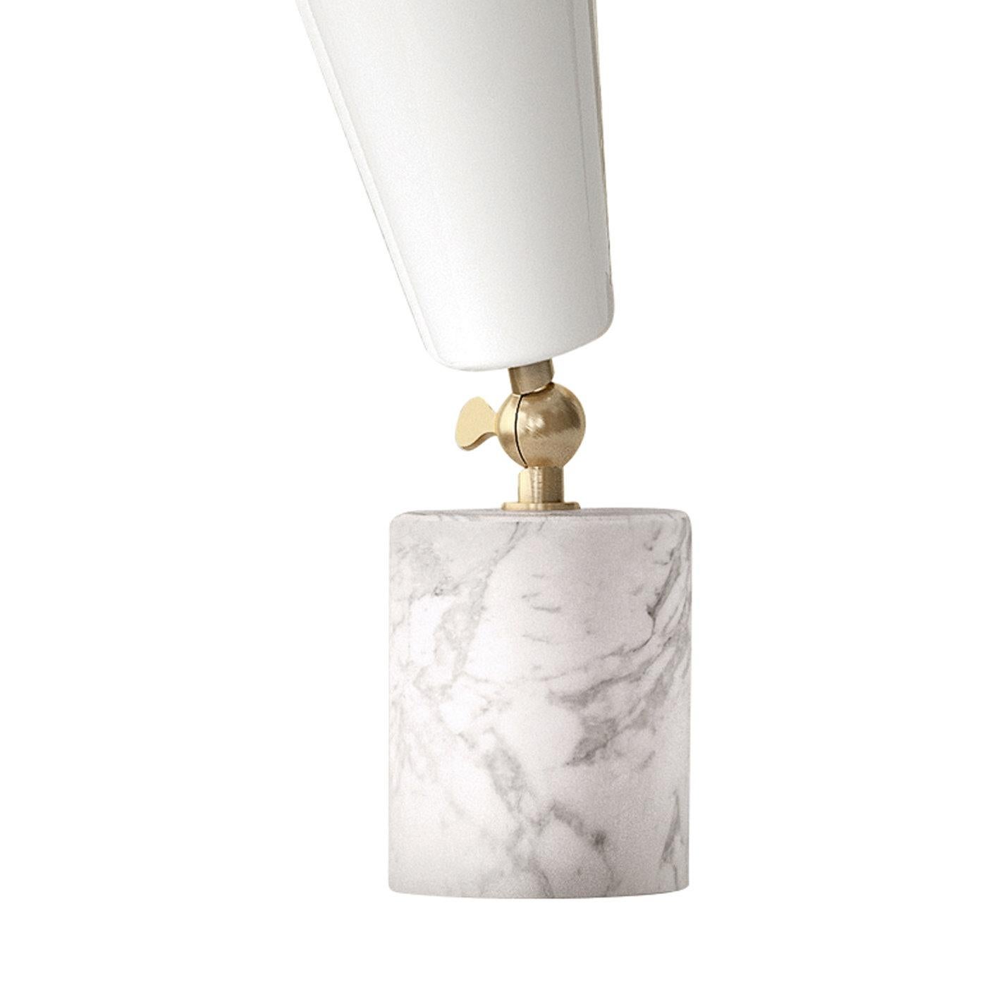 US 110v table lamp with white Carrara marble base, satin brass metal parts and adjustable glossy white diffuser, available from showroom display. 
Measures: 5
