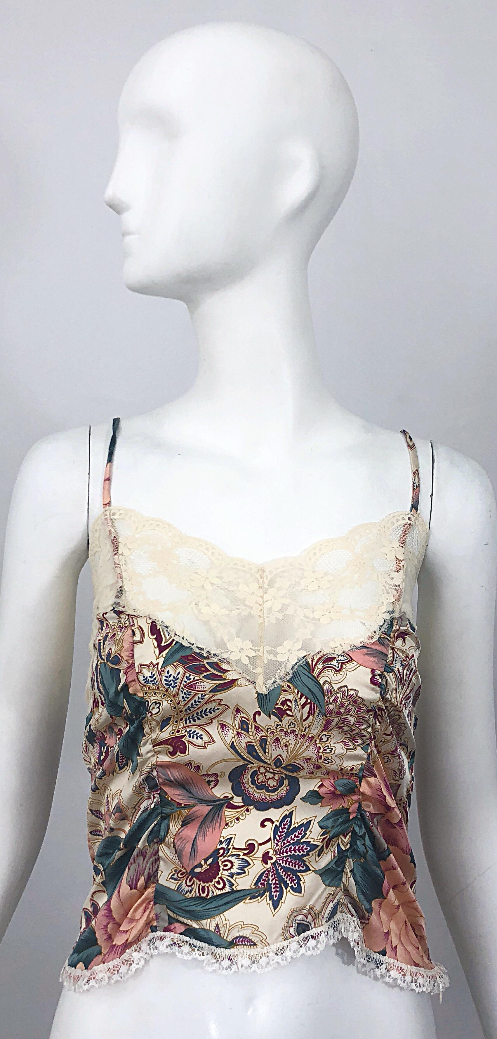 Beautiful late 1990s VOYAGE silk lace paisley floral printed crop top. Features an allover paisley print in vibrant hues of blue, pink, purple and burgundy throughout on an ivory silk. Flattering ruching detail. Fantastic quality, with the heavy eye