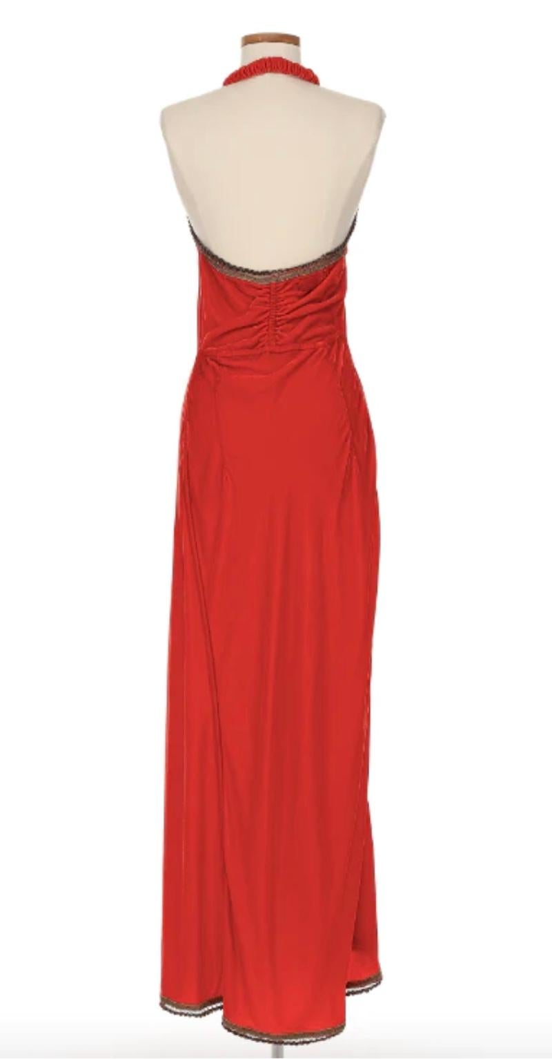 Voyage Orange Velvet Halter Dress. Considered the 90s cult London label, Voyage was a coveted brand loved for its eclectic and quirky designs. Worn by Kate Moss, Linda Evangelista and the other 