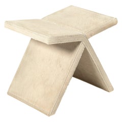 Voyage pouf by Hessentia Upholstered with Off-White Leather