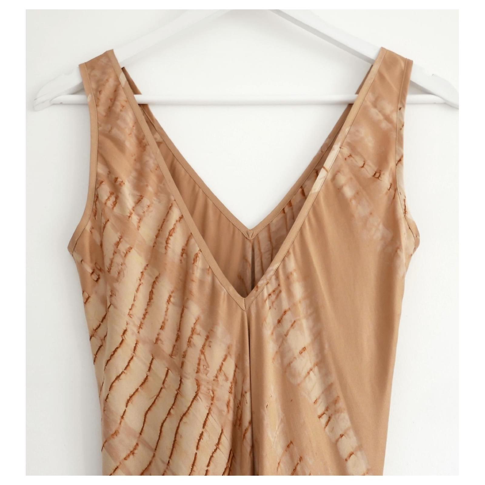 Utterly divine Voz double V tie dye dress. Cult New York eco label. Bought for £825 and new with tags. Crafted from dark gold tie dye silk charmeuse, it has a super flattering bias cut with v neck front and slightly lower v neck back. Size S and