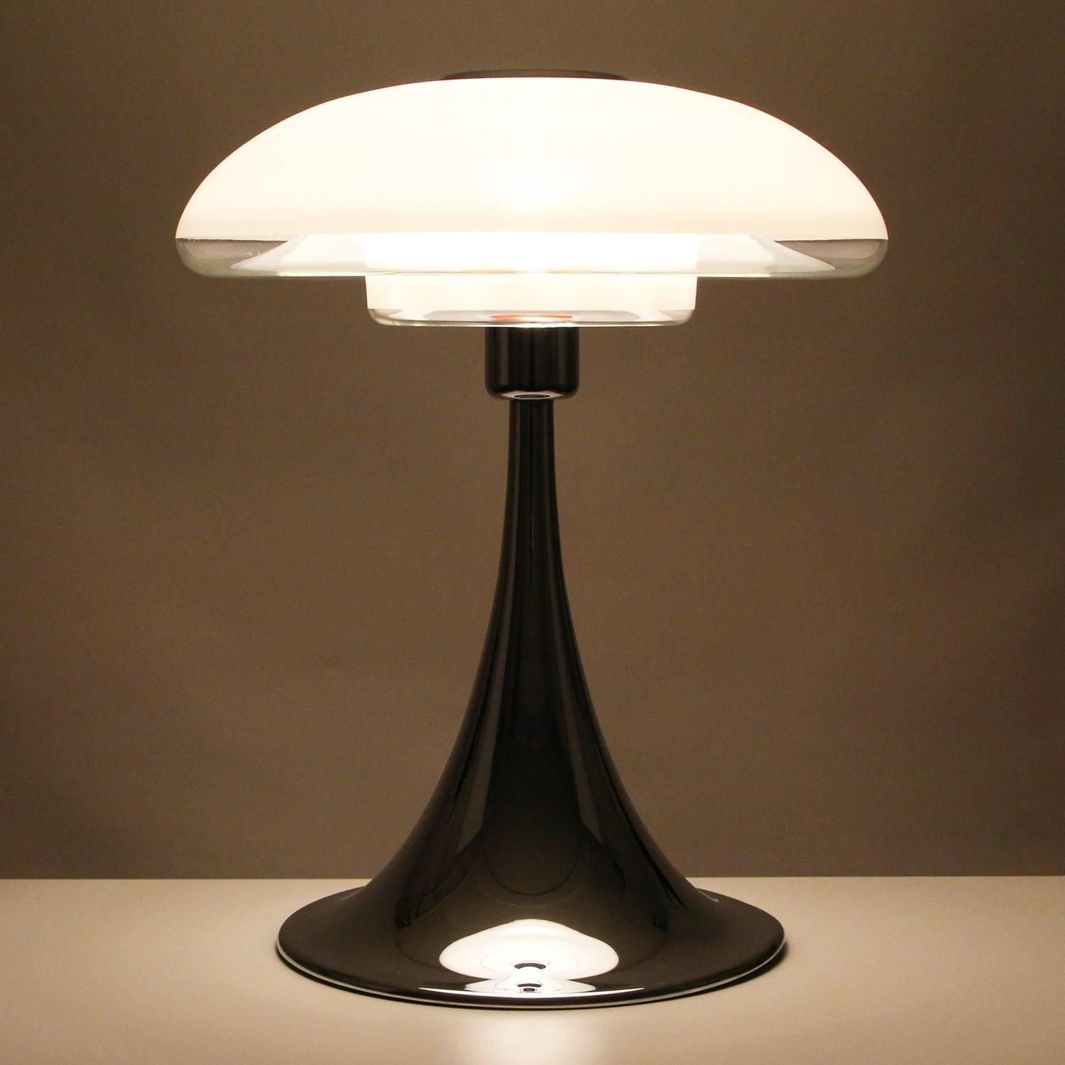 VP Europa, large table lamp by Verner Panton in 1977 and produced by Louis Poulsen the following year - rare opal and chrome table light.

If you are looking for grade A, top-tier, rare, collectible Danish designer lighting, look no further! You