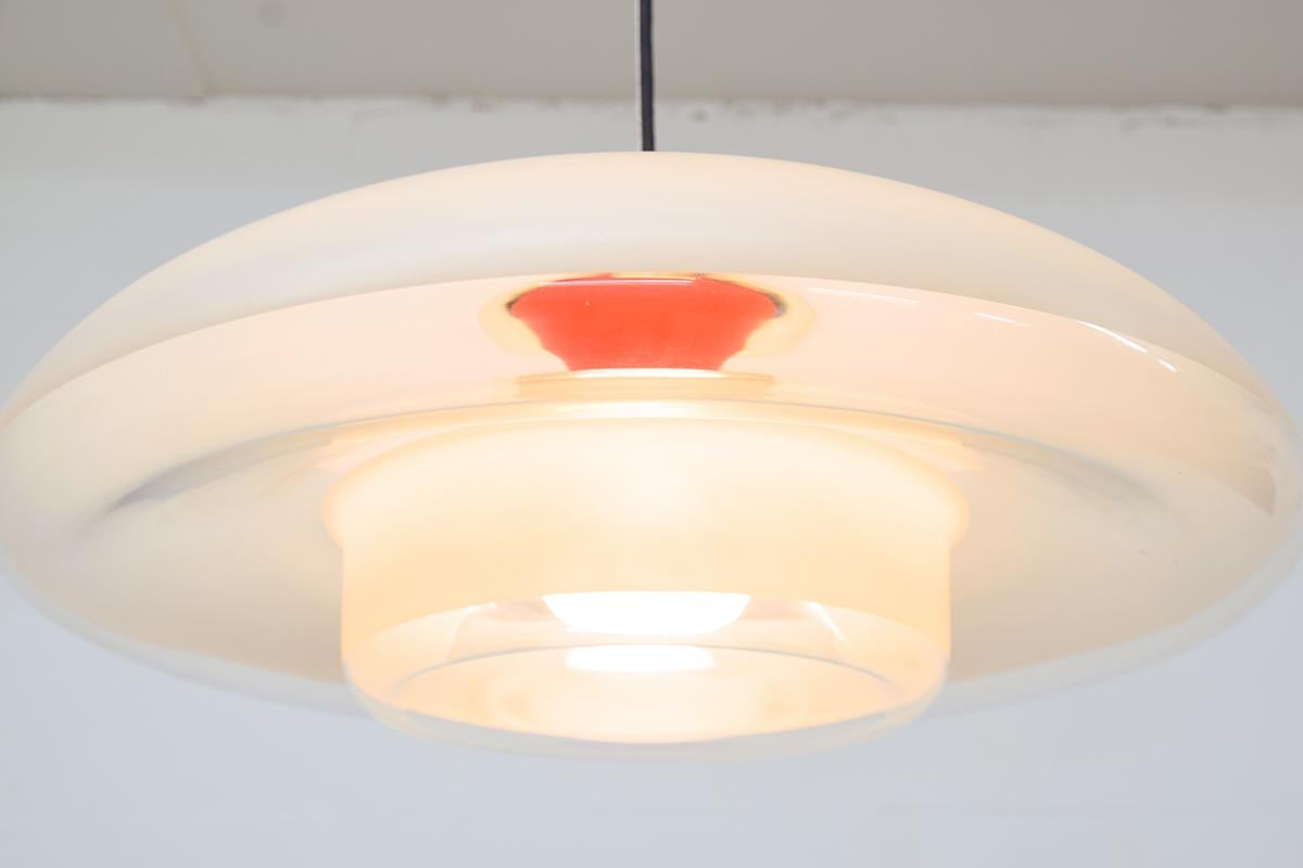 VP Europa pendant designed by by one of Denmark's most influential 20th century furniture and interior designers Verner Panton in 1978, Made by Louis Poulsen. The pendant has mouth-blown glass shades. The shade is partly clear glass, partly