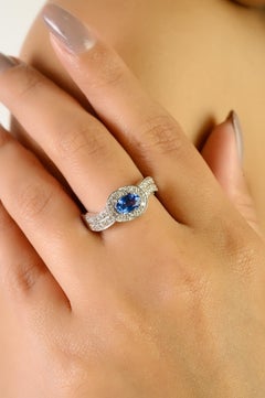 VR Jewels 14K White Gold Oval Cut Blue Sapphire and Diamond Halo Wave Ring