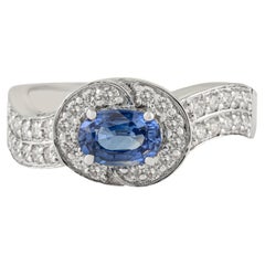 VR Jewels Bague ondulée en or blanc 14 carats avec saphir bleu de taille ovale et diamant en halo