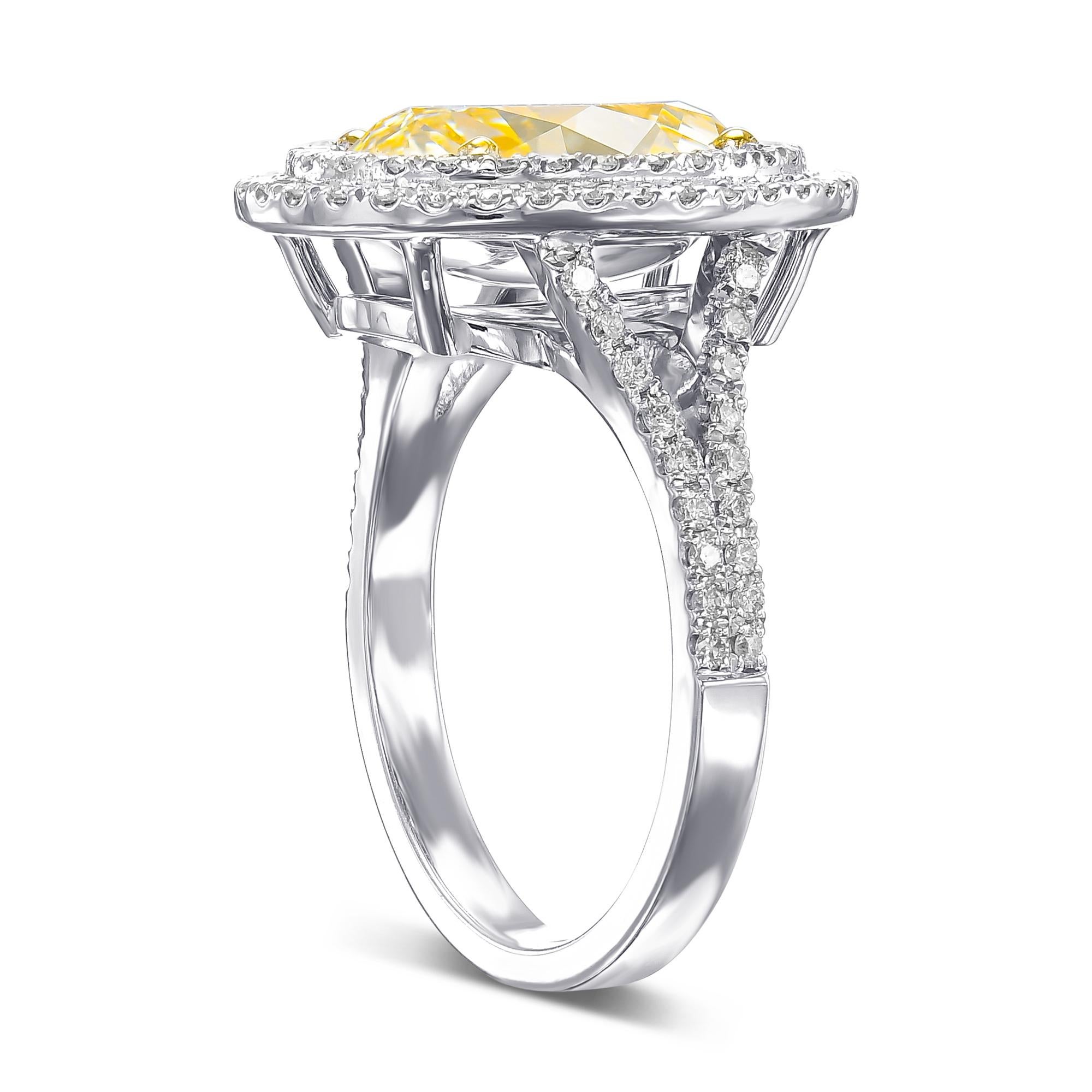 Today we are offering this amazing ring featuring a center 4.02 carat Oval Fancy light yellow diamond adorned by 0.80cttw double halo white diamonds. 
A once in a lifetime opportunity to become the proud owner of this amazing ring. The ring has