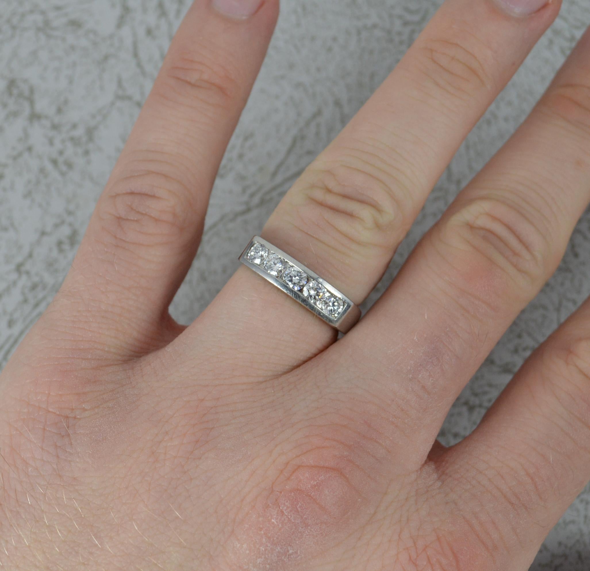 A Platinum and Diamond five stone design stack ring.
​Designed with five natural round brilliant cut diamonds in tension style setting. A total weight of 0.75 carats approx. Very clean, white and sparkly natural diamonds.
17mm spread of stones,