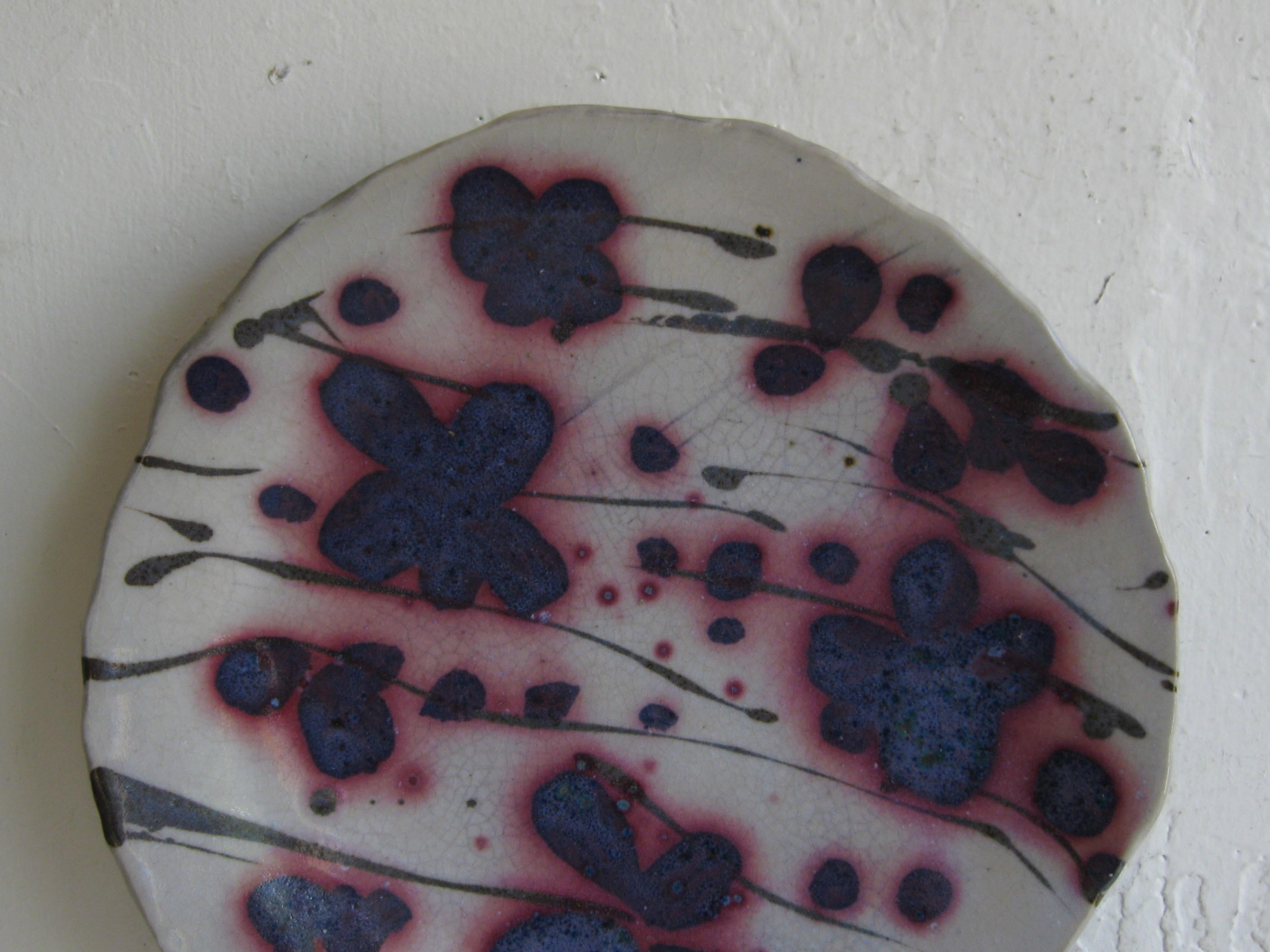 Very hard to find Janet Rothwoman California studio art pottery plate/plaque dating from the 1960's. Janet was the wife of Jerry Rothman. This plate is a slab construction and has a wonderful abstract design and form. Signed with the makers hallmark