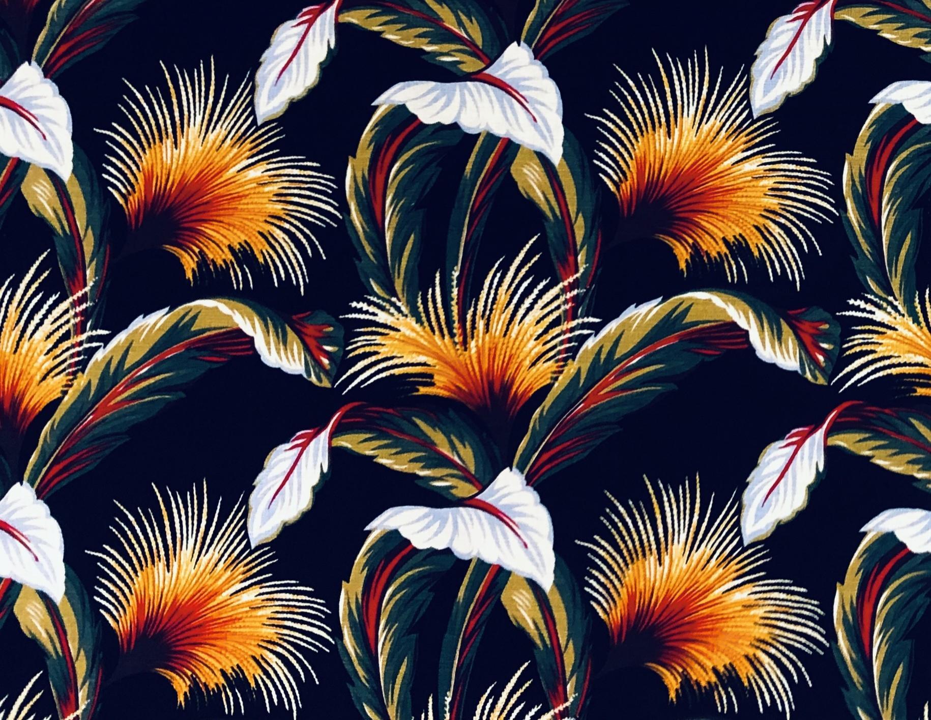 This beautiful 100% cotton fabric features a striking tropical print of yellow and orange flowers and radiant multicolored leaves on a black background. It's designed by Tradewind Tropicals for Hoffman Fabrics #HMED003 in 2001. This fabric is