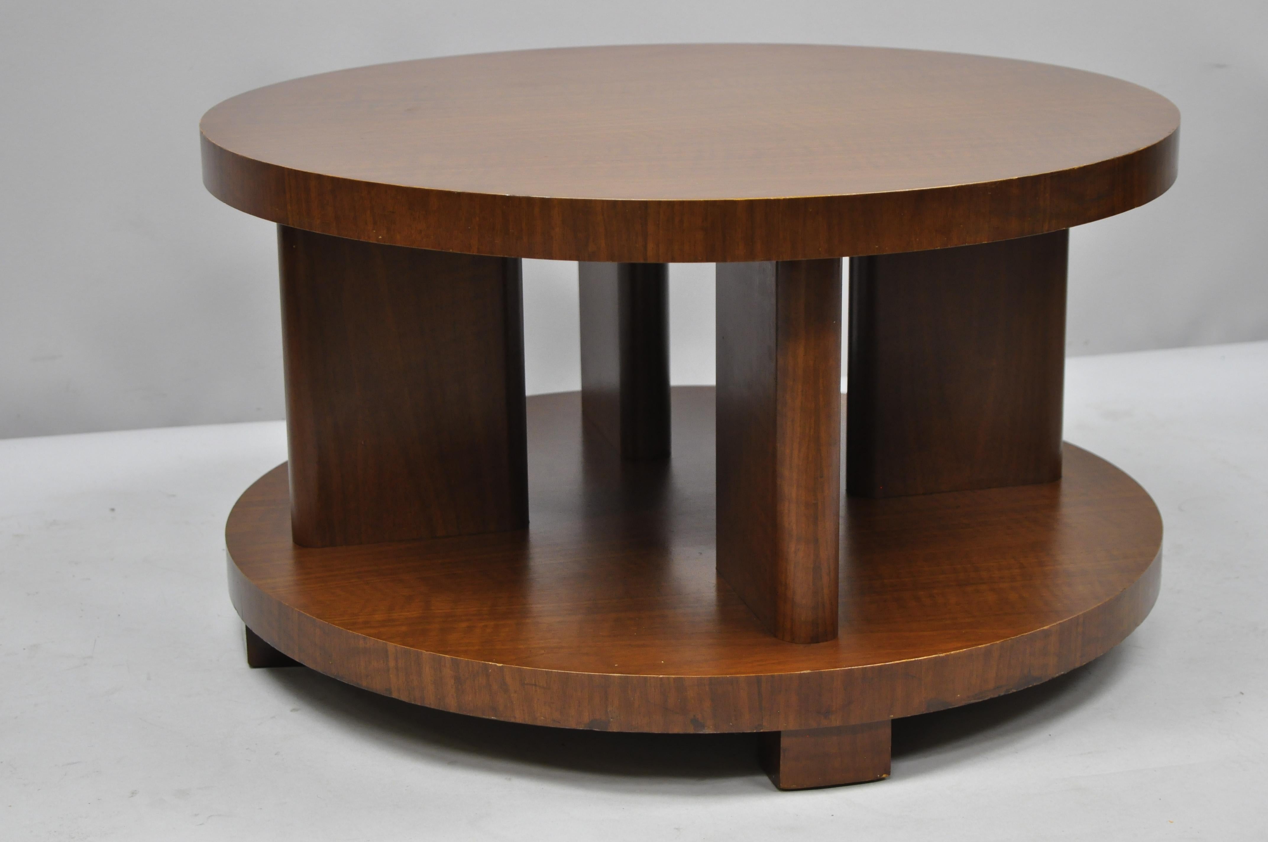 Vintage Art Deco French round mahogany 3-piece coffee end tables After Gilbert Rohde. (3) piece set (2) end tables (1) small round coffee table, multiple tiers, wood construction, beautiful wood grain, quality craftsmanship, great style and form,
