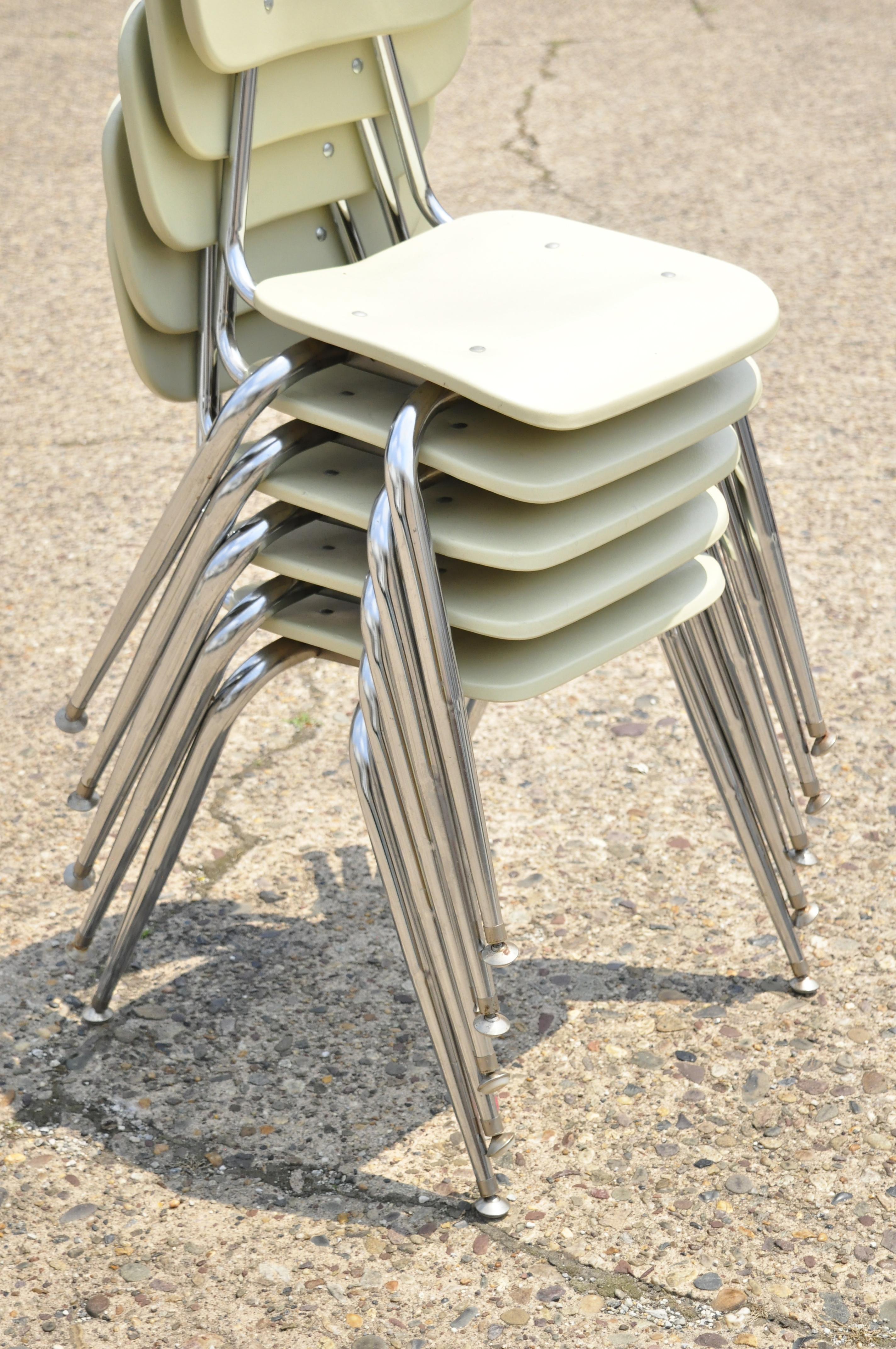 Vtg Beige Molded Plastic Chrome Metal Base Stacking School Side Chairs, Set of 4 In Good Condition For Sale In Philadelphia, PA
