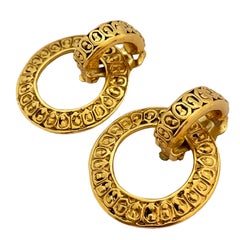 Vtg CHANEL Made in France gold door knocker clip on earrings