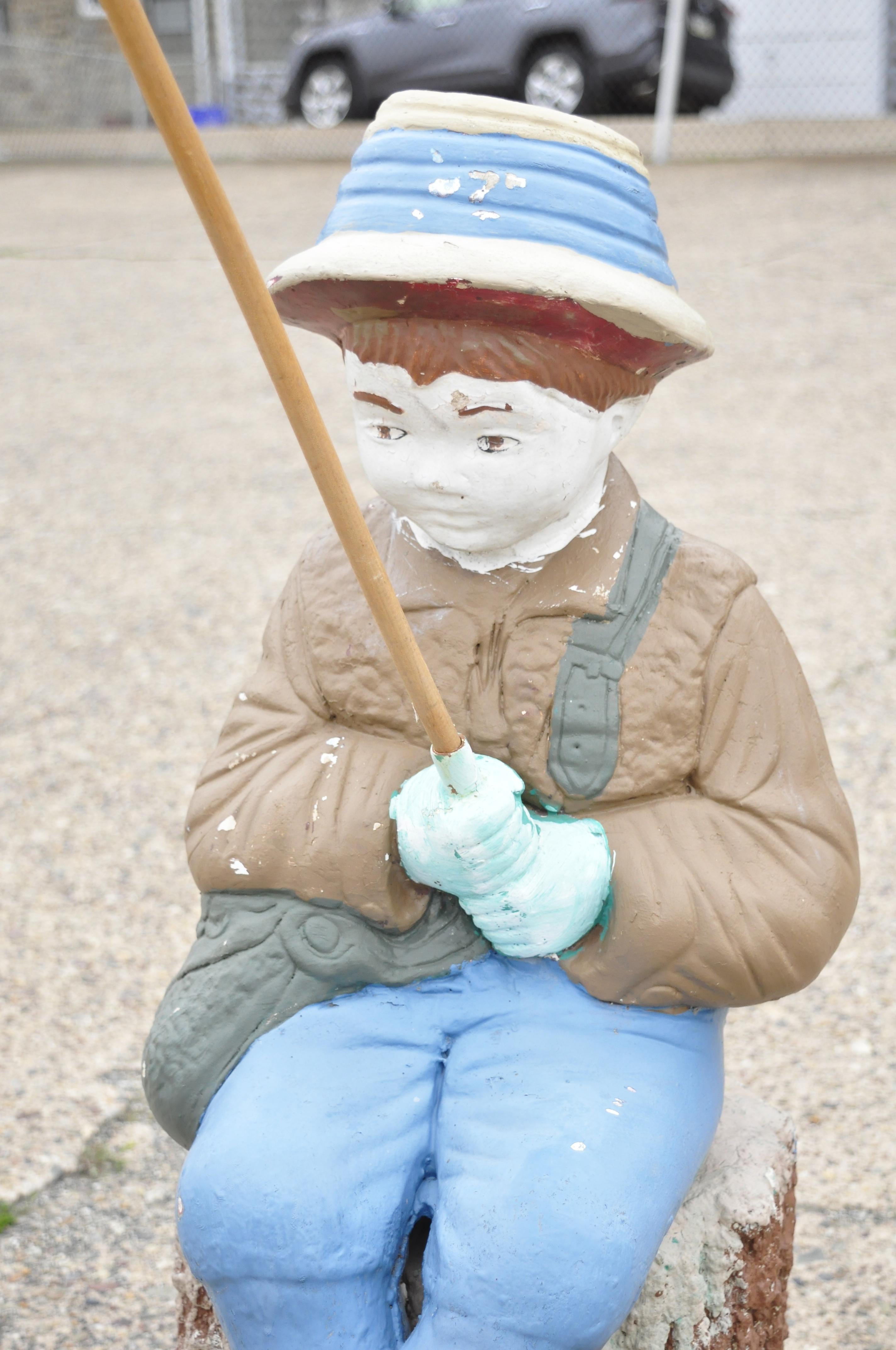 vintage fishing boy statue