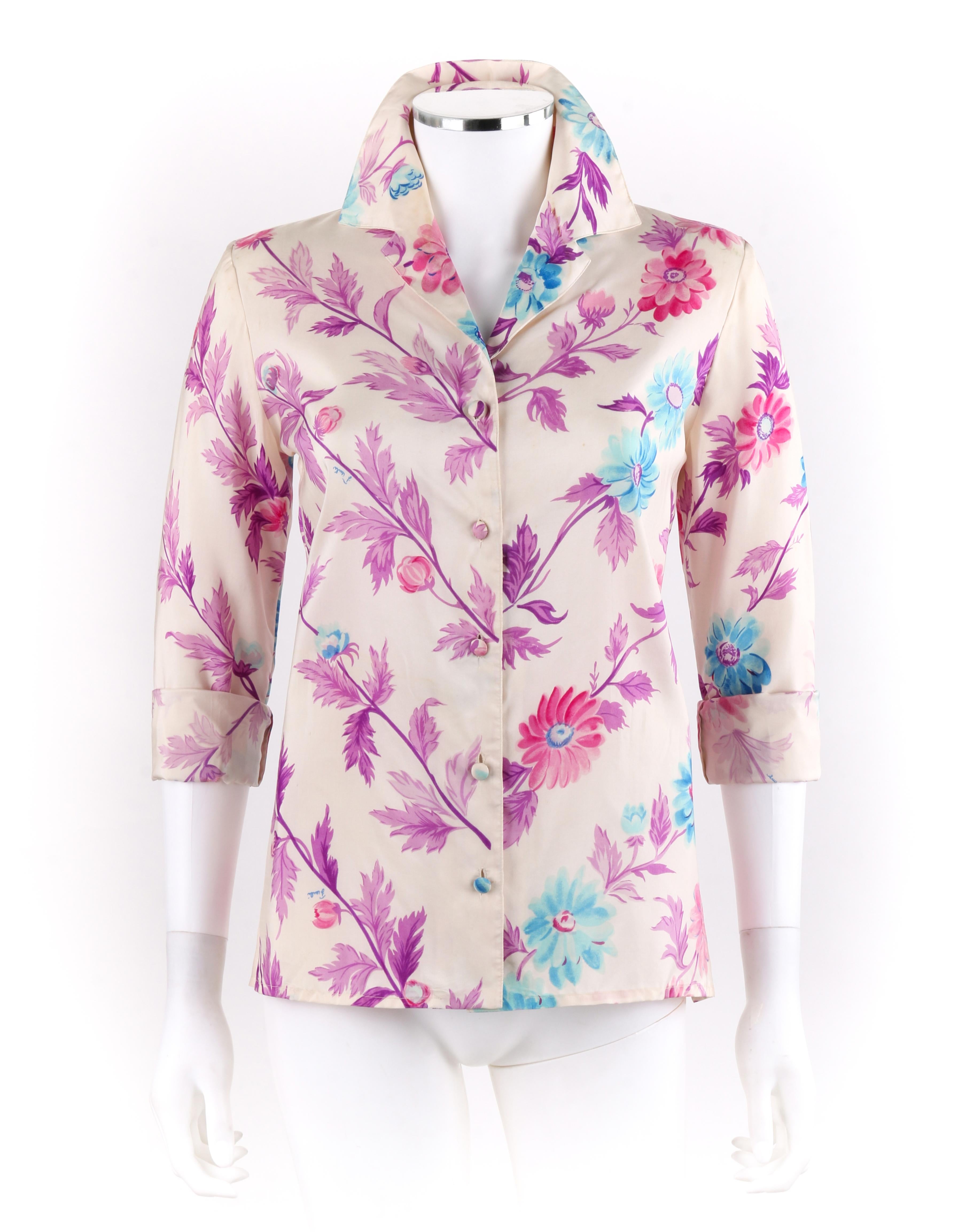 Vtg. EMILIO PUCCI c.1970’s Cream Daisy Floral Leaves Silk Button-Down Shirt Top

 
Circa: 1970’s
Label(s): Emilio Pucci   
Style: Blouse
Color(s): Shades of cream, pink, purple and blue.
Lined: No
Marked Fabric Content: 100% Silk
Additional Details