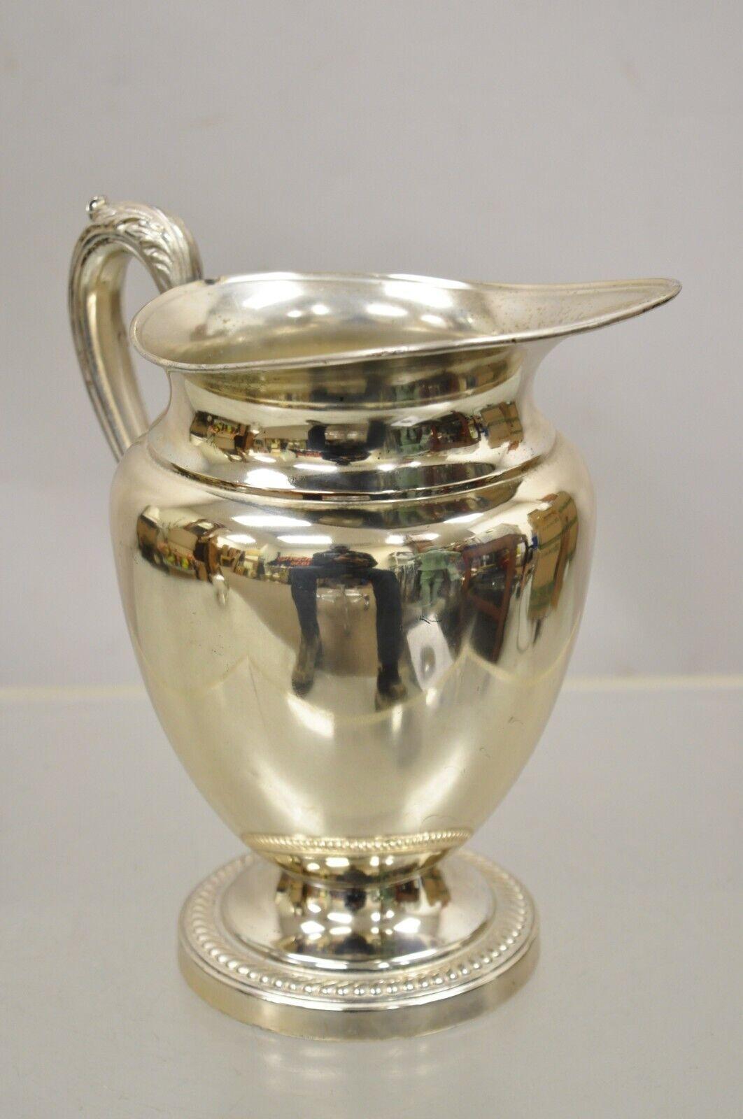 crescent silver pitcher