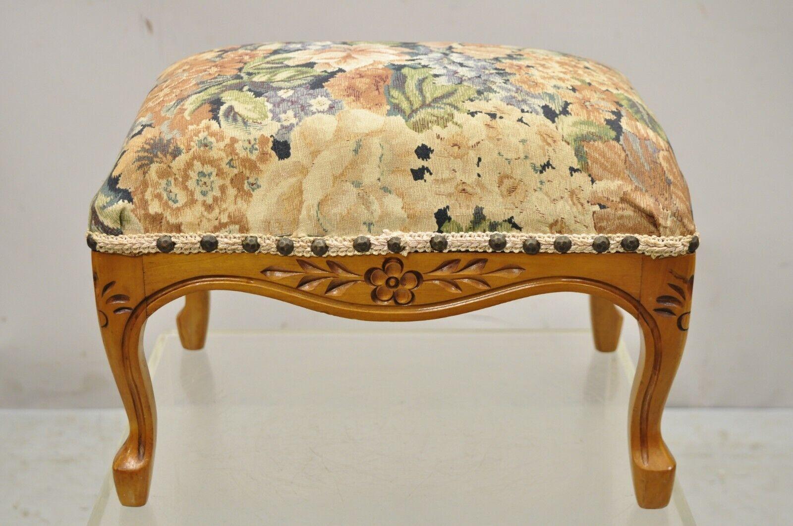 Vintage French Country Provincial Louis XV style maple wood small ottoman footstool. Item features floral tapestry upholstery, solid wood frame. Circa mid-20th century. Measurements: 11