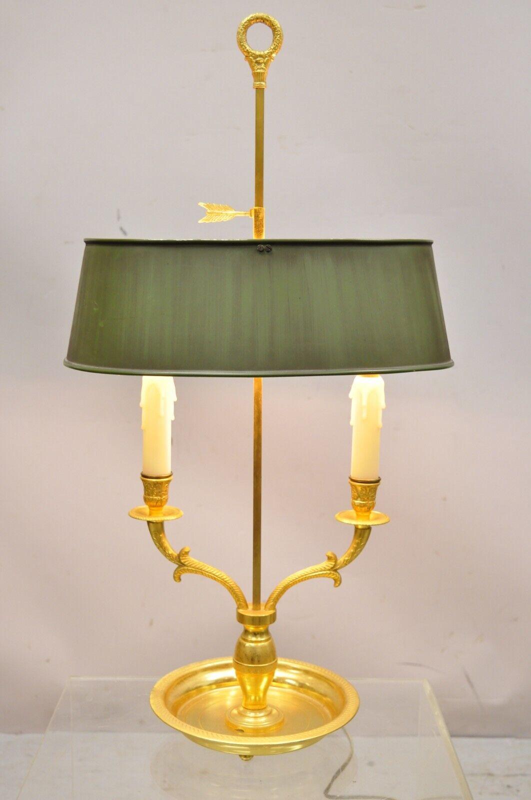 Vintage French empire gold bronze bouillotte desk lamp with green tole metal shade. Item features a bronze french frame, twin light sockets, adjustable height green tole metal shade, very nice vintage item, great style and form. Circa mid-20th