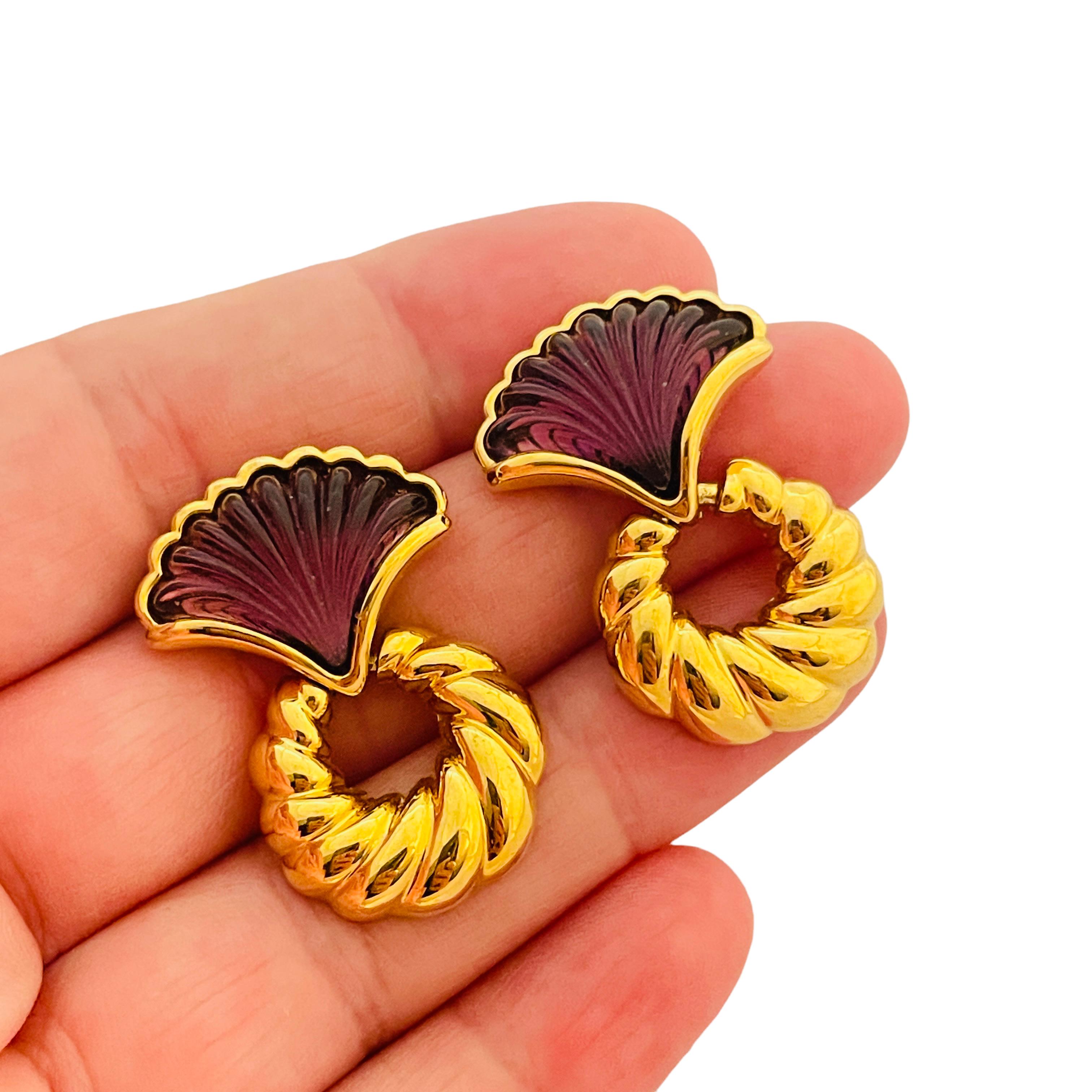 DETAILS

• unsigned

• gold tone with glass

• vintage designer runway earrings

MEASUREMENTS

•  1.25