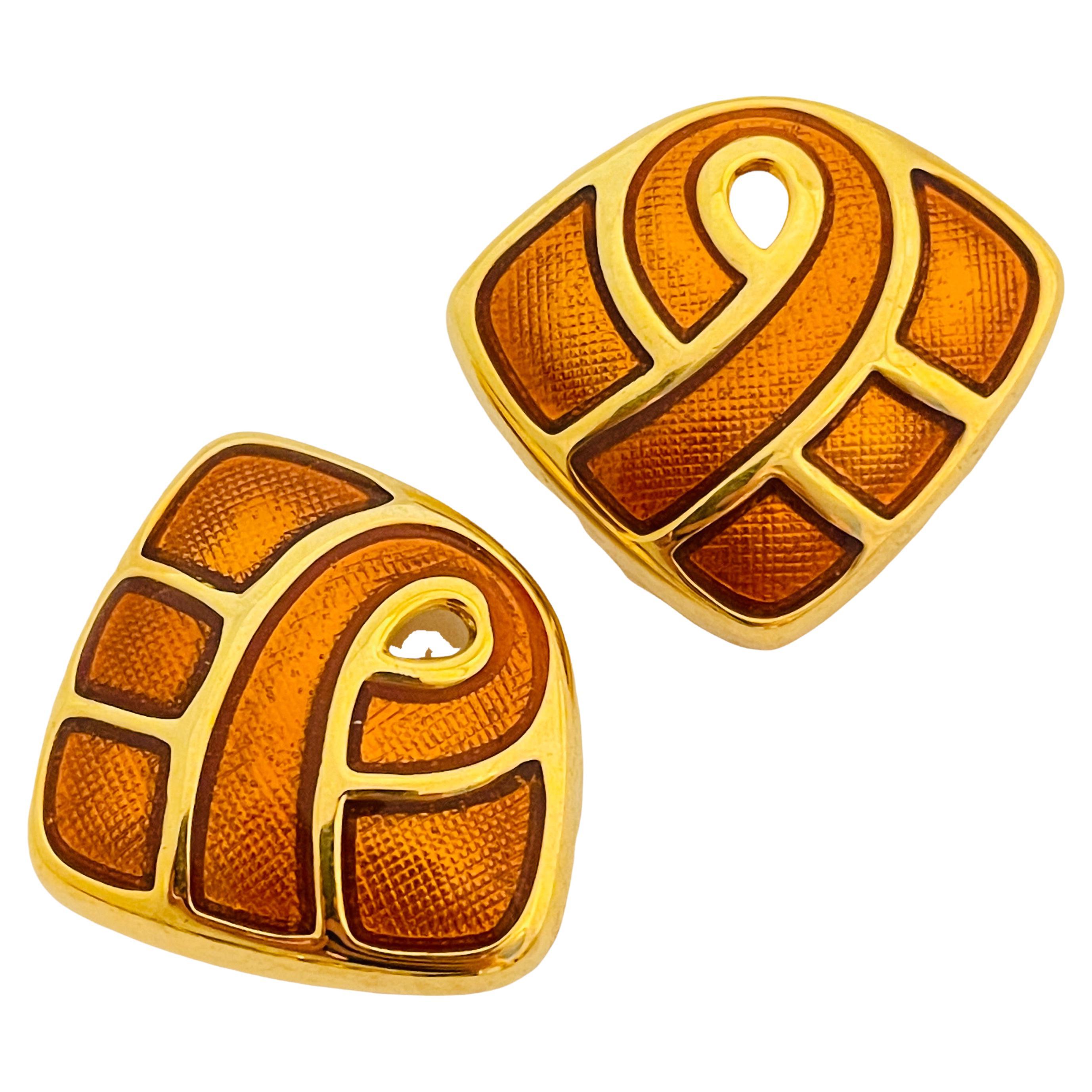 Vtg gold enamel designer runway clip on earrings For Sale