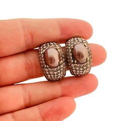 Vtg HEIDI DAUS gold purple rhinestone clip on earrings designer runway