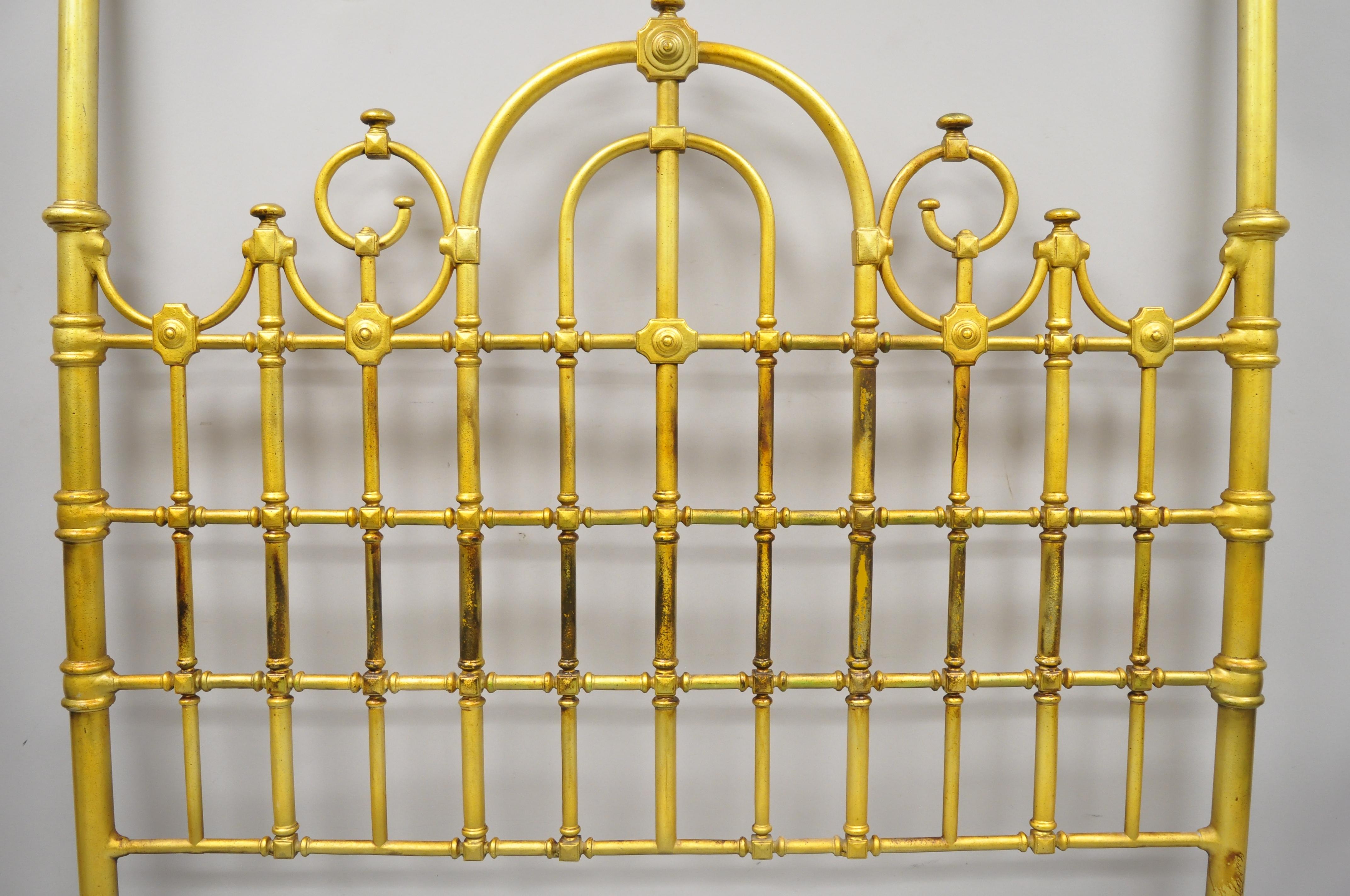 Vintage Italian Hollywood Regency style gold gilt iron metal tall post bed headboard. Queen size (Additional hole mounts for a full mattress as well, see pic #9). Item includes a gold gilt finish, tall posts, ornate frame, great style and form,