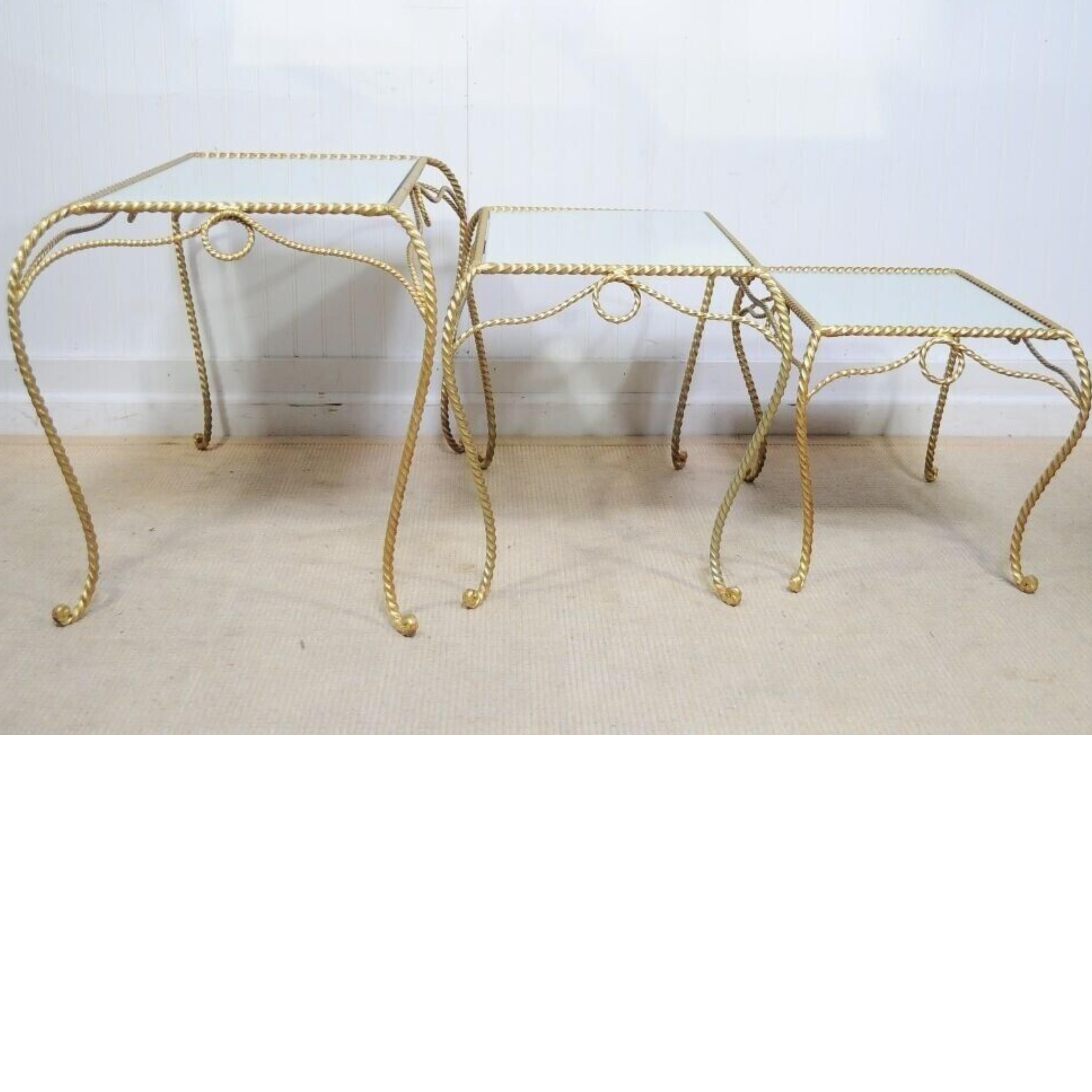 Vintage Italian Hollywood Regency Gold Nesting Rope Mirror Tole End Tables - Set of 3
Item features scrolling frames, mirrored tops, graduating size, very nice vintage set. 
Circa Mid 20th Century.
Measurements: 
Small Table: 14