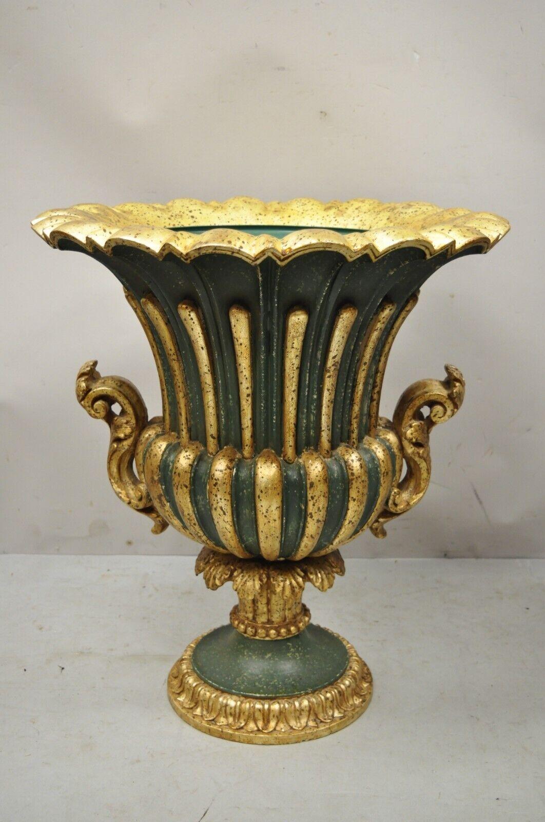Vintage Italian Hollywood Regency green and gold large carved wood urn planter pot. Item features green and gold gilt distressed finish, solid carved wood frame, metal planter pot, stamped 