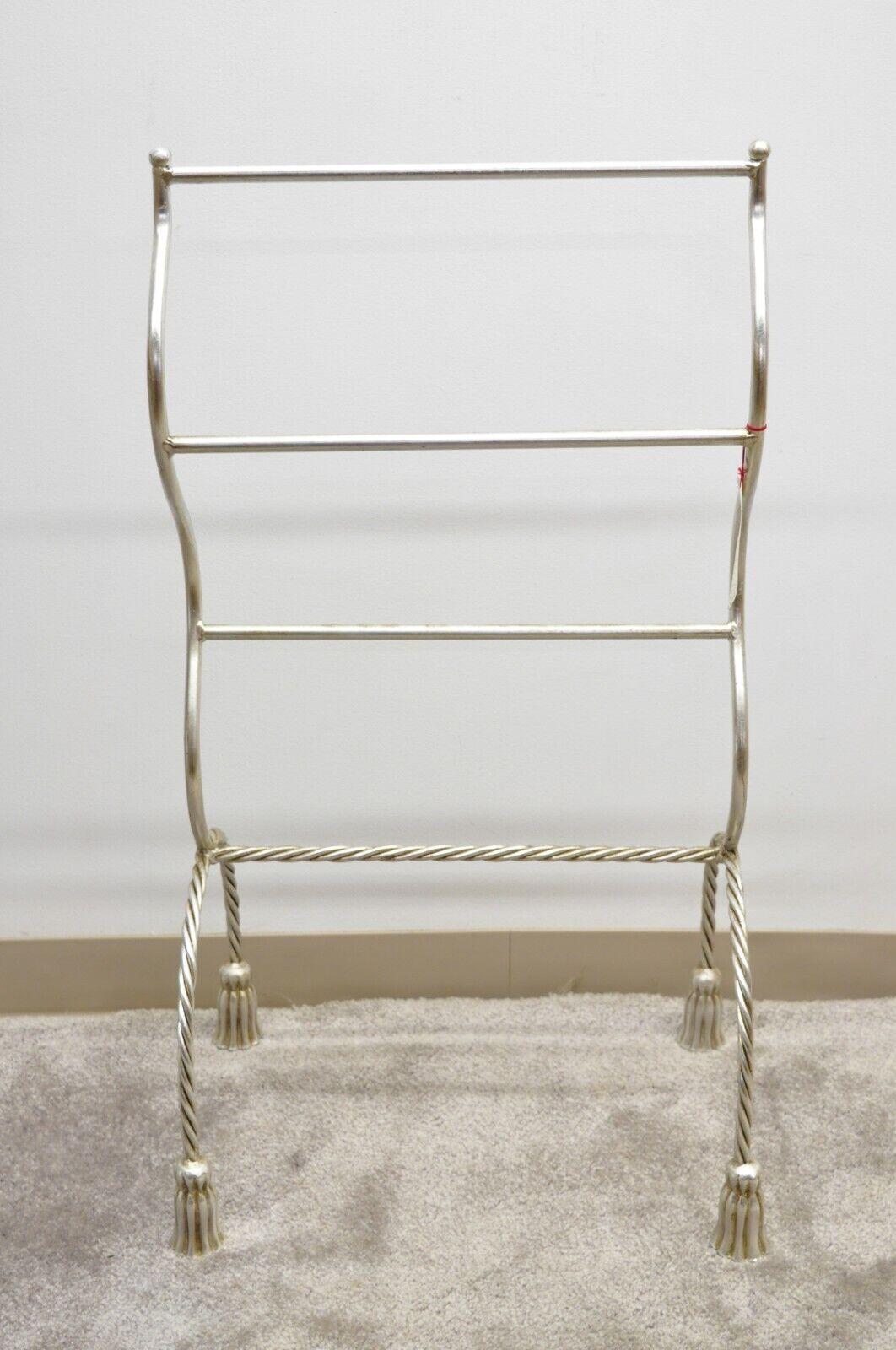 Vintage Italian Hollywood Regency Silver Gilt Metal Iron Towel Rack with Tassel Feet. Item features a silver gilt finish, sculptural metal frame, tassel form feet, original label, quality Italian craftsmanship, great style and form. circa Mid to