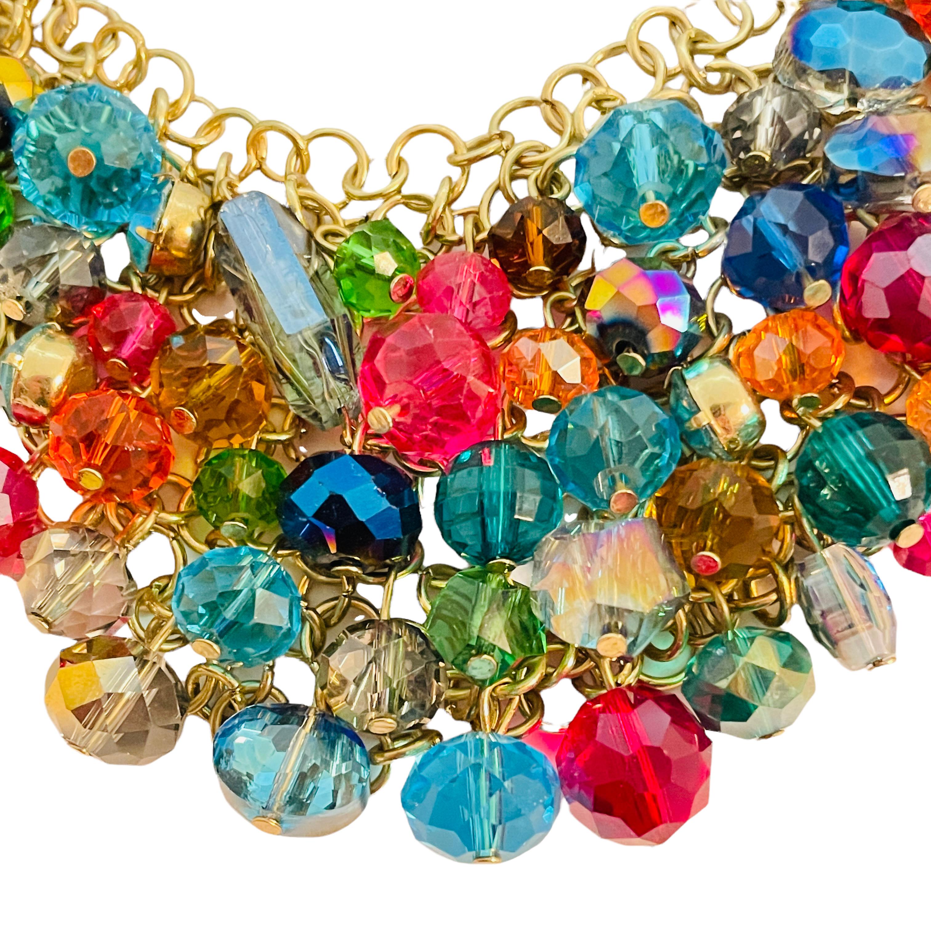 DETAILS

• unsigned

• gold tone with colorful crystals

• vintage designer runway necklace

MEASUREMENTS

• 21