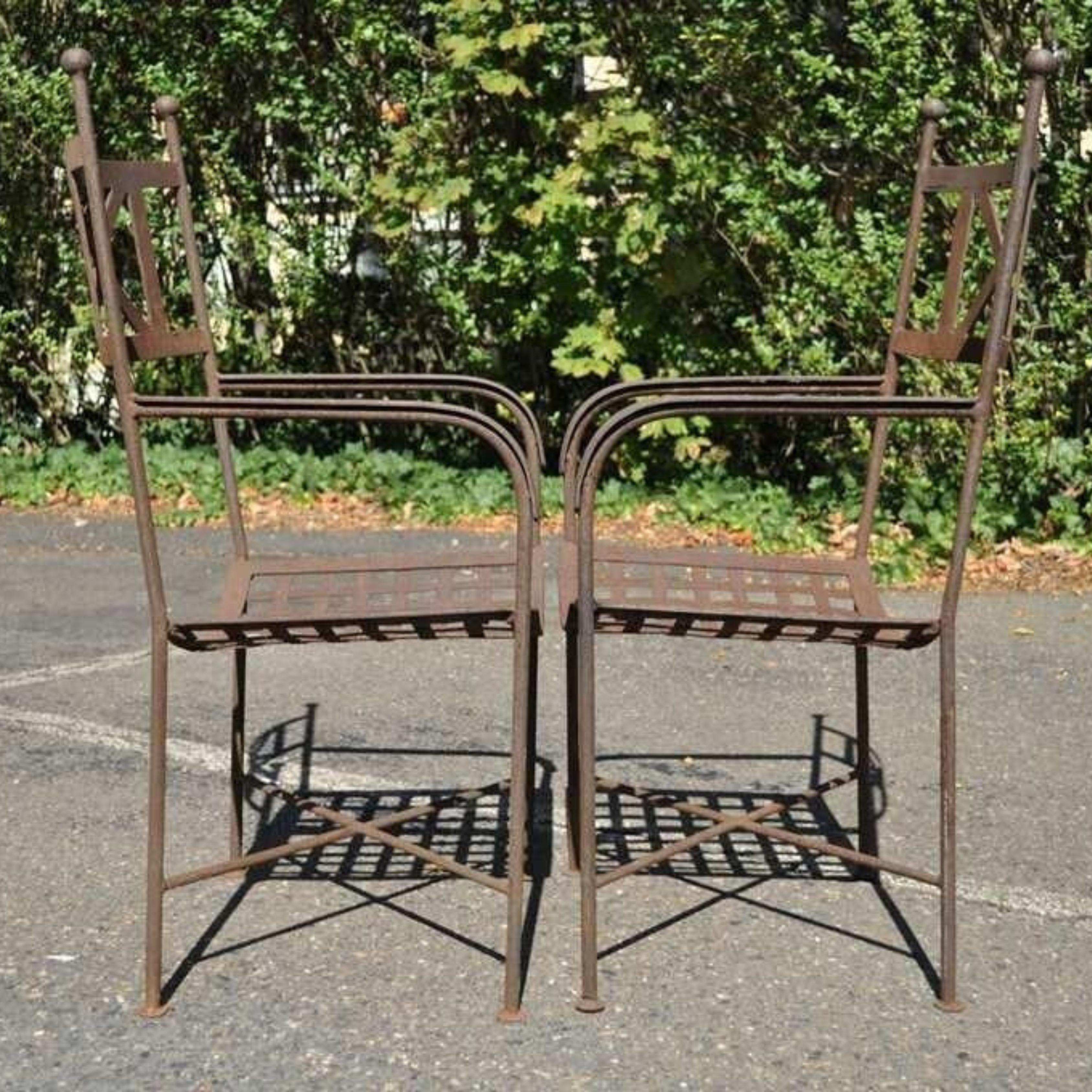 Early 20th Century Vtg Neoclassical Regency Style Iron X Form Stretcher Garden Arm Chairs - a Pair For Sale