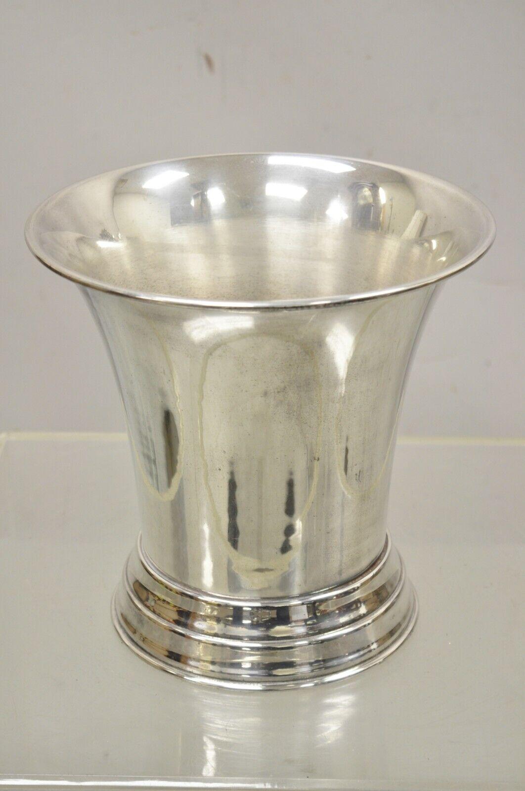 Vintage Silver Plated Modern Fluted Regency Style Champagne Chiller Wine Ice Bucket. Item features a nice fluted body, footed base, round form, very nice vintage item, clean modernist lines, great style and form. Circa Mid to Late 20th Century.