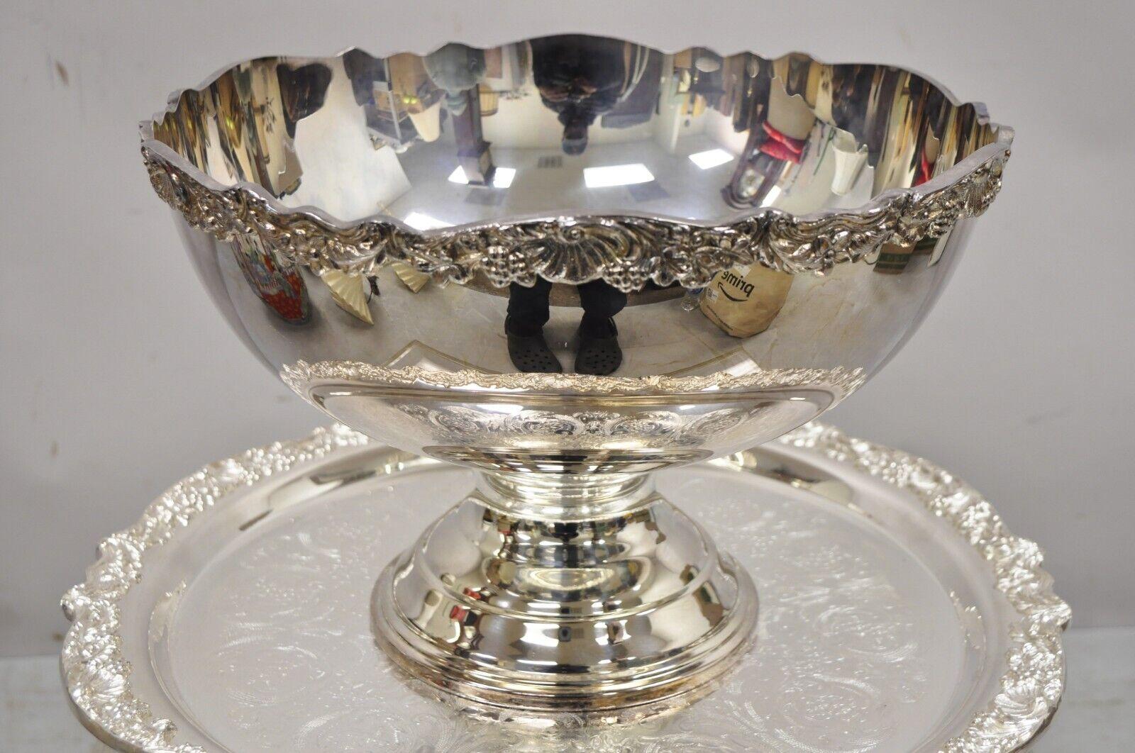 Vintage towle silver plated victorian style punch bowl set - 20 cups tray and punch bowl. Item features (20) cups, large punch bowl, ornate round platter, wonderful detail, spoon/ladle included, very nice vintage set. Circa early to mid-20th