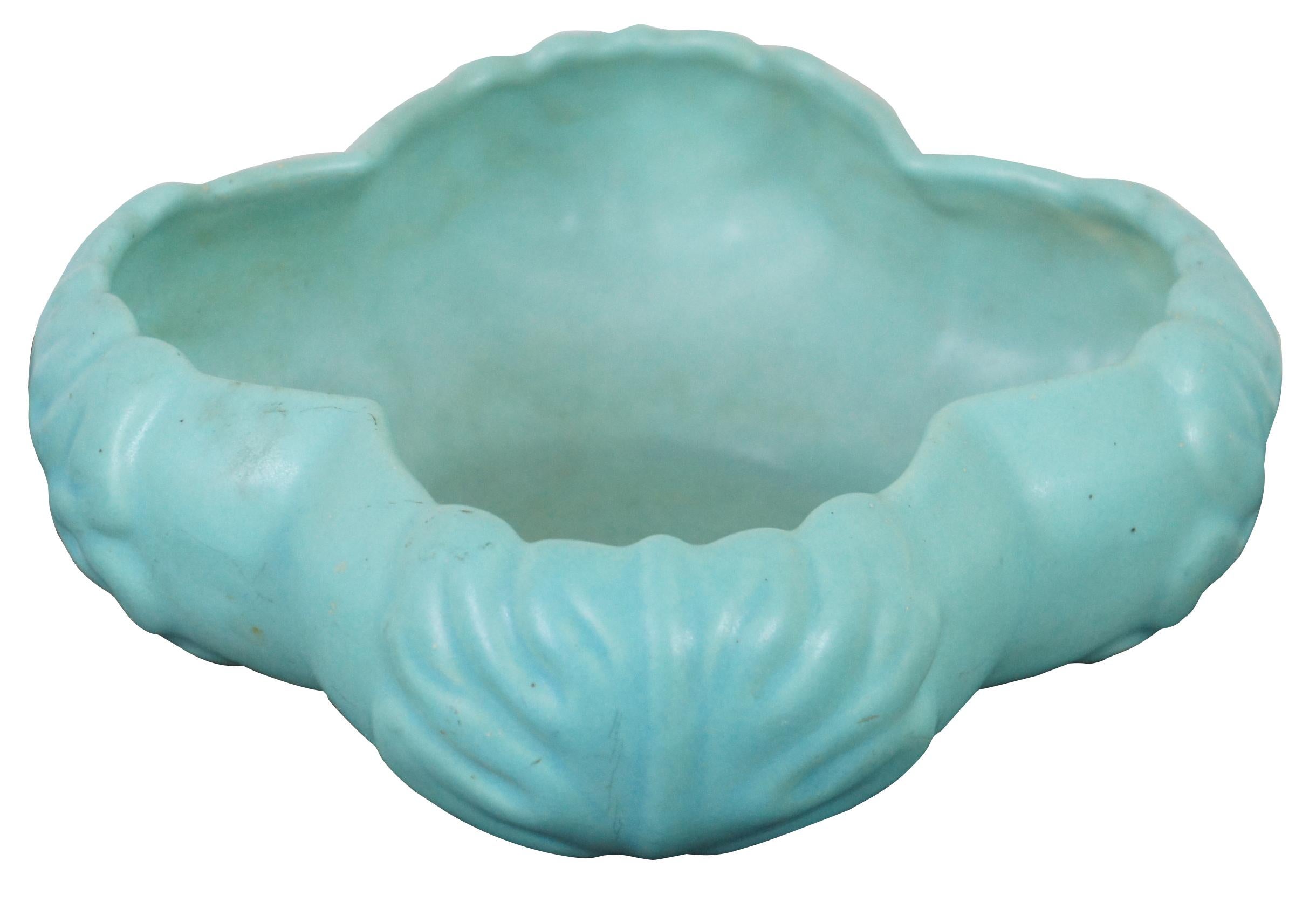 Vintage turquoise or robin’s egg blue clover shaped dish by Van Briggle Pottery of Colorado Springs.
   