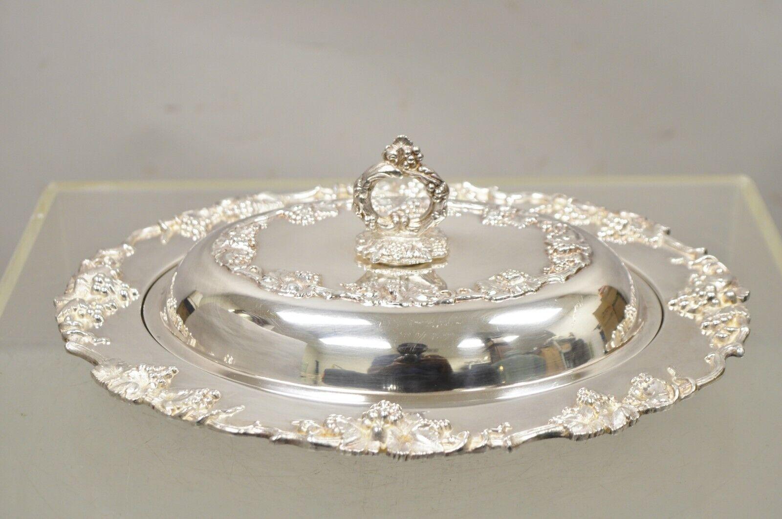 Vintage Victorian Style Grapevine & Grape Cluster Silver Plated Serving Platter Dish. Item features grapevine & grape cluster design, ornate handle with lid. Circa  Mid to Late 20th Century. Measurements: 4