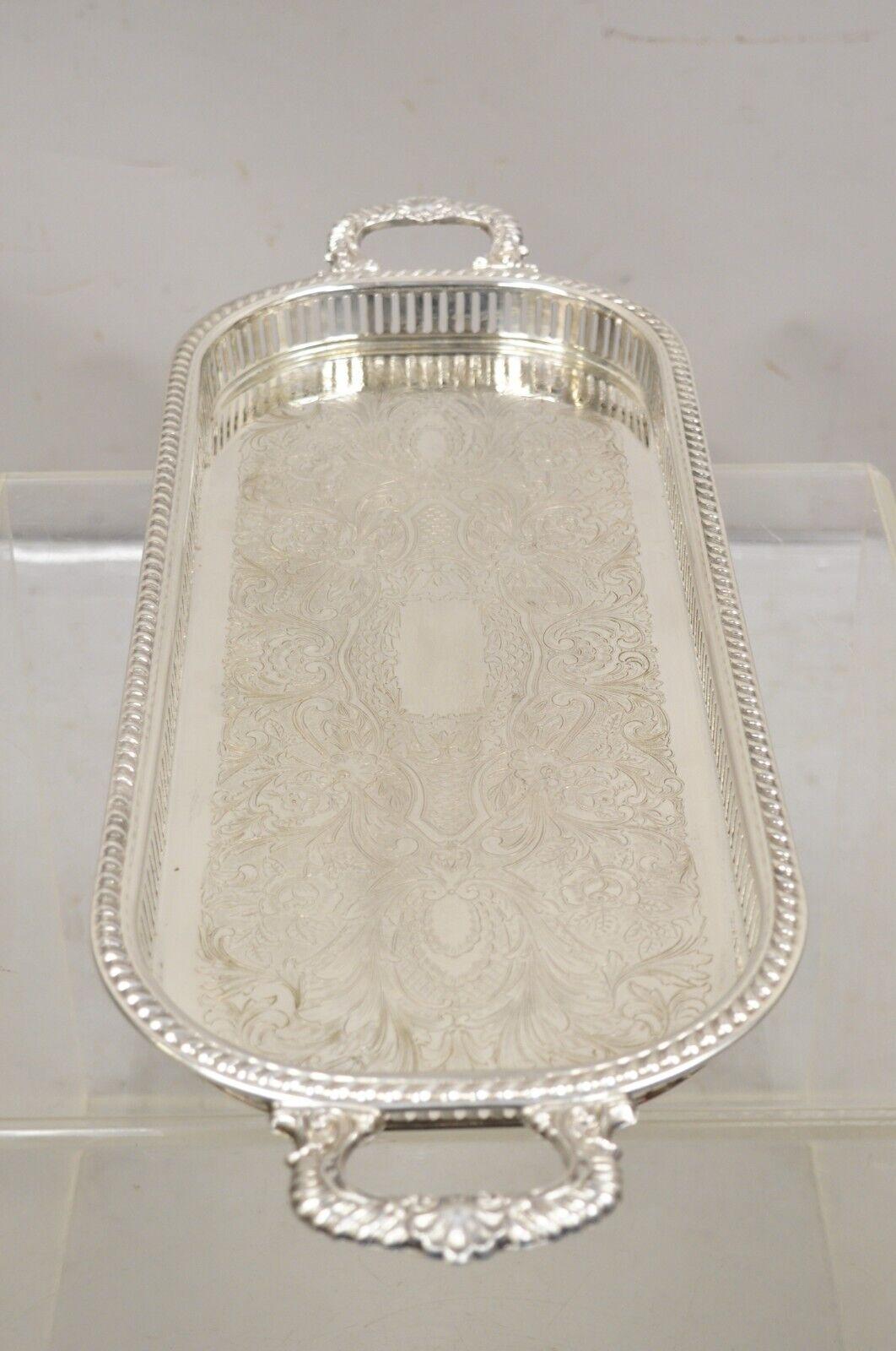 Vintage Victorian Style Silver Plated Narrow Oval Serving Platter Tray by Regency. Circa Mid 20th Century. Measurements:  2.5