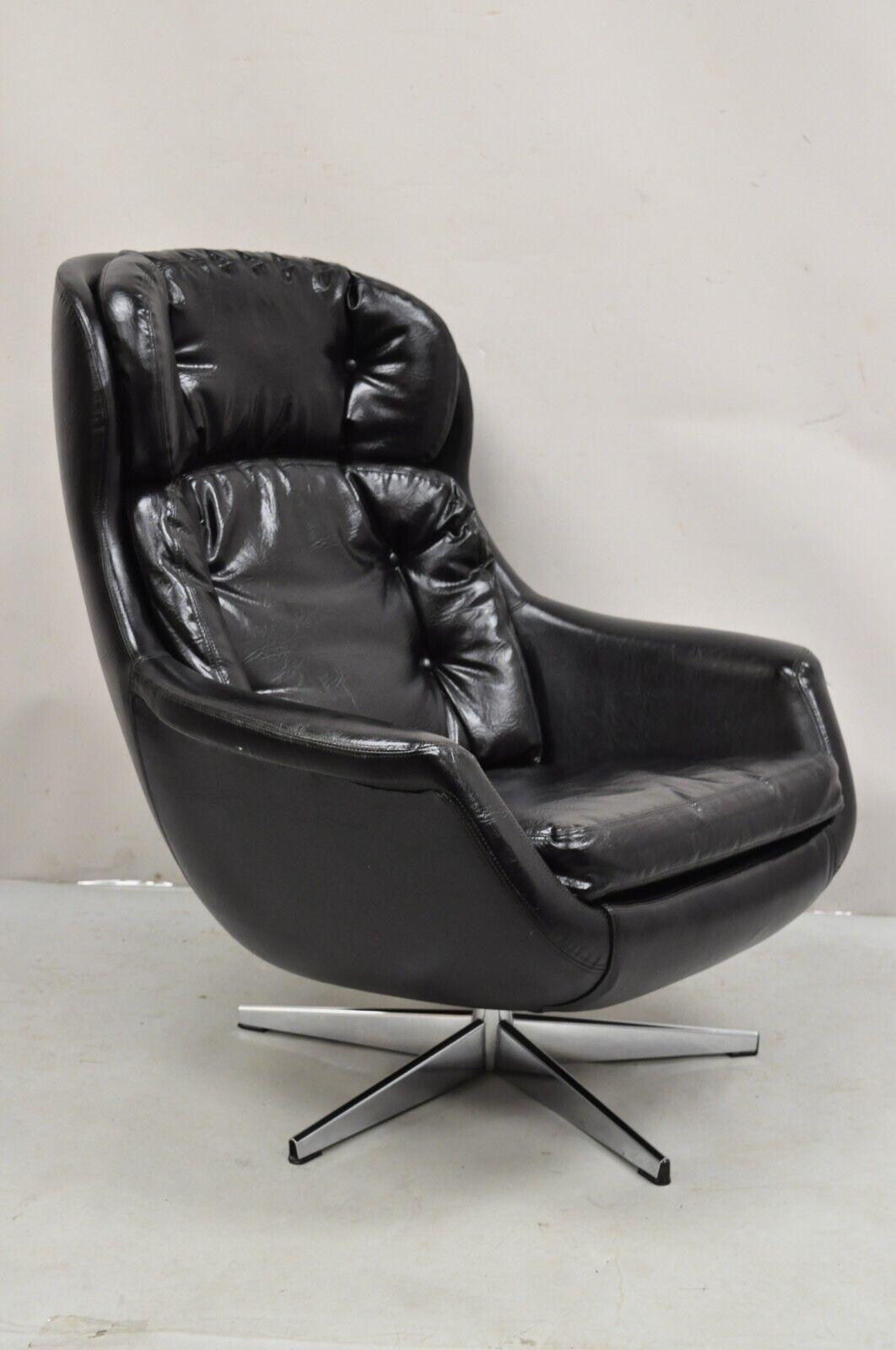 Vintage W&J Sloane Black Vinyl Mid Century Modern Selig Overman Style Swivel Lounge Chair. Circa 1960s. Measurements: 36