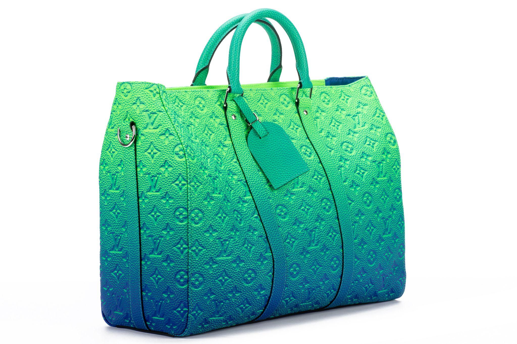 Virgil Abloh takes the House’s classic weekend bag into a maximalist world of color and energy. The bright florescent colors of the Taurillon Illusion leather give an entirely new feel to the embossed Monogram pattern that adorns this bag. New with