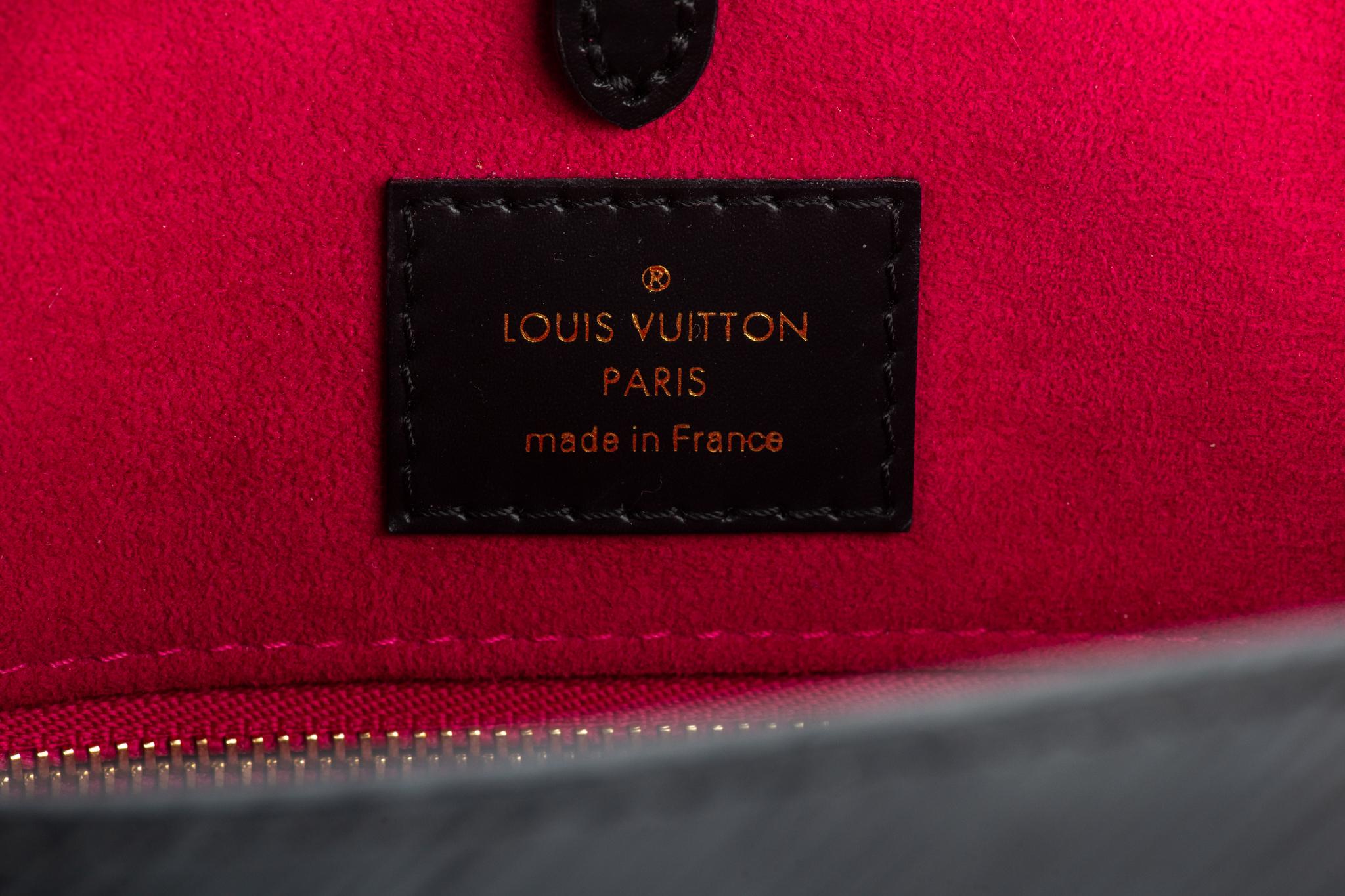 Vuitton Epi On The Go MM noir/fuchsia en vente 5