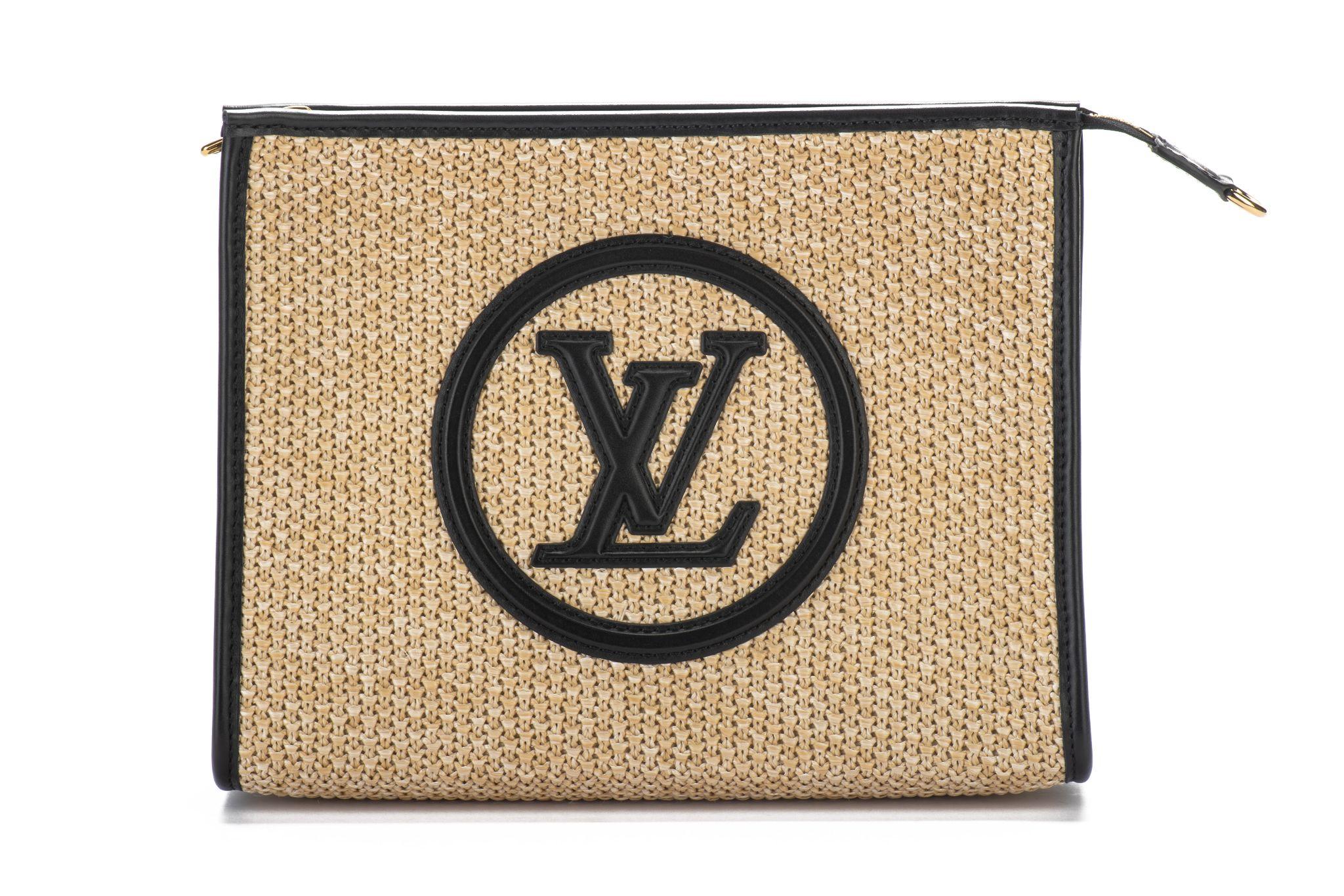 Louis Vuitton sold out worldwide raffia shoulder bag/clutch. Woven raffia and black leather trimming. Comes with original dust cover and box.