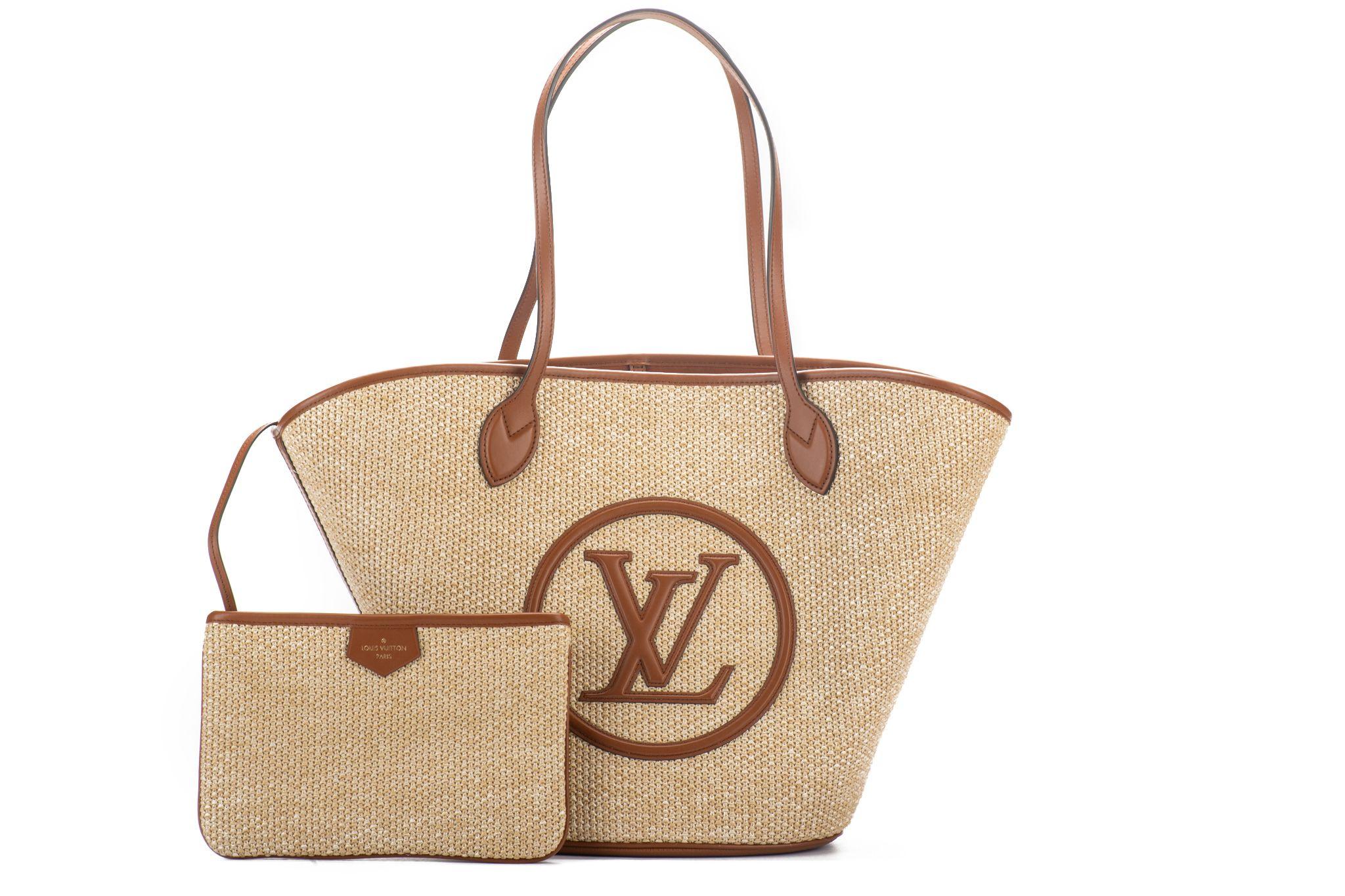 Louis Vuitton sold out worldwide large Saint Jacques raffia tote with caramel leather trimming. Handles drop 11
