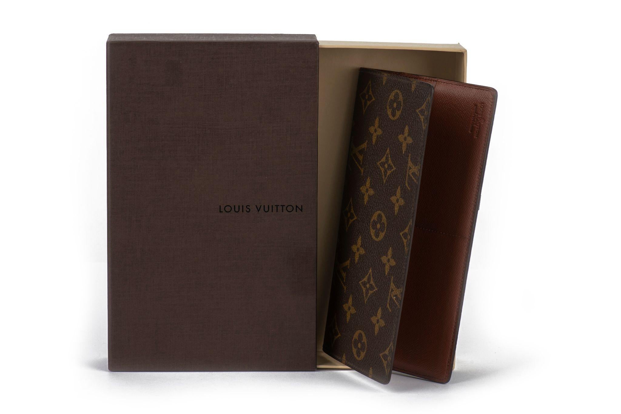 Louis Vuitton classic monogram checkbook holder in excellent condition. Coated canvas with contrast stitching. Comes with original box.